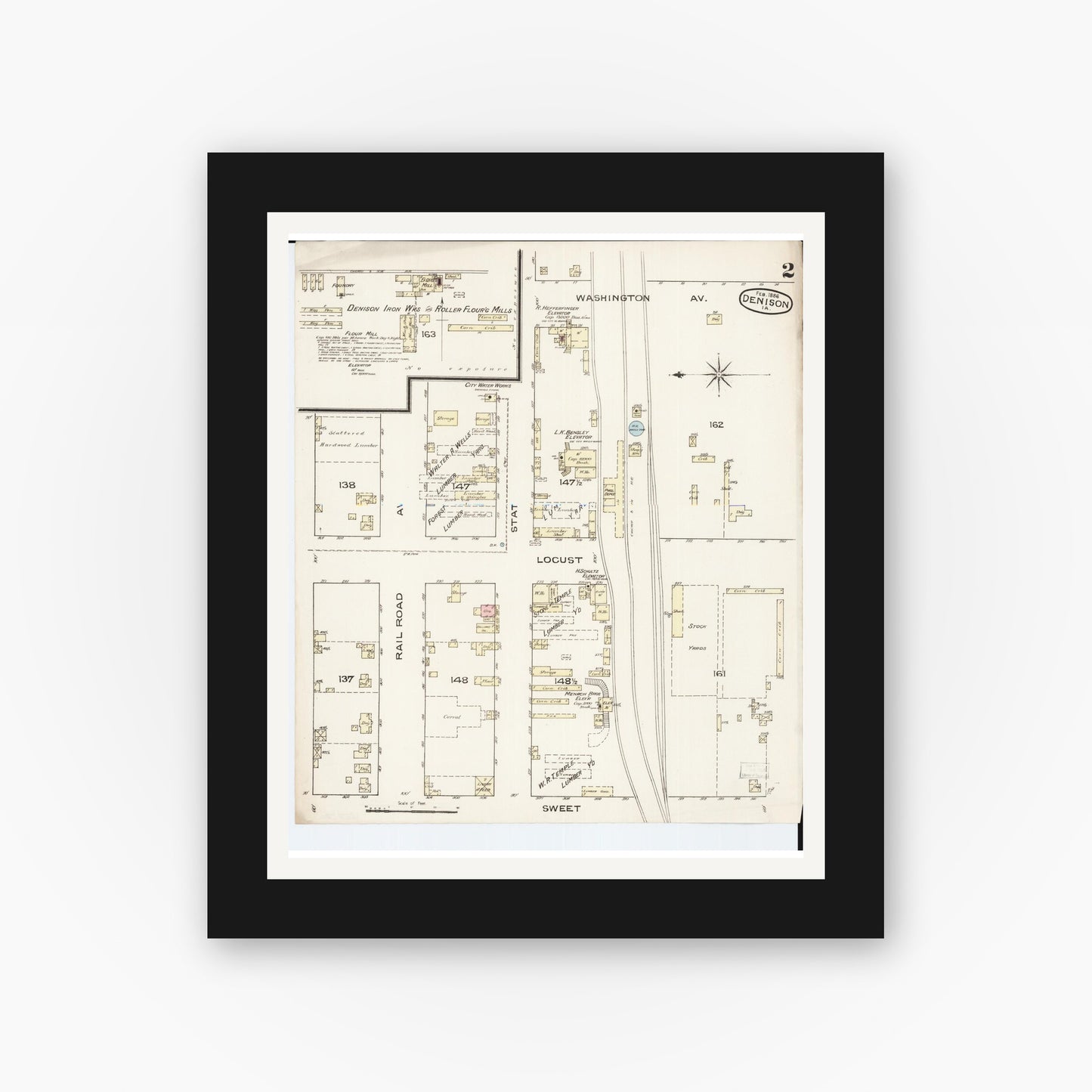 Old map wall art mockup — black gallery frame with white mat — Sanborn Fire Insurance Map from Denison, Crawford County, Iowa (1886), Sheet #0002