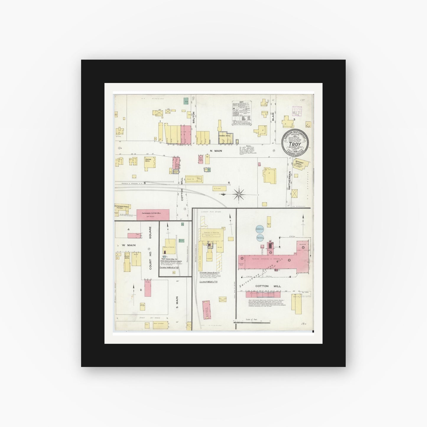 Old map wall art mockup — black gallery frame with white mat — Sanborn Fire Insurance Map from Troy, Montgomery County, North Carolina (1908), Sheet #0001