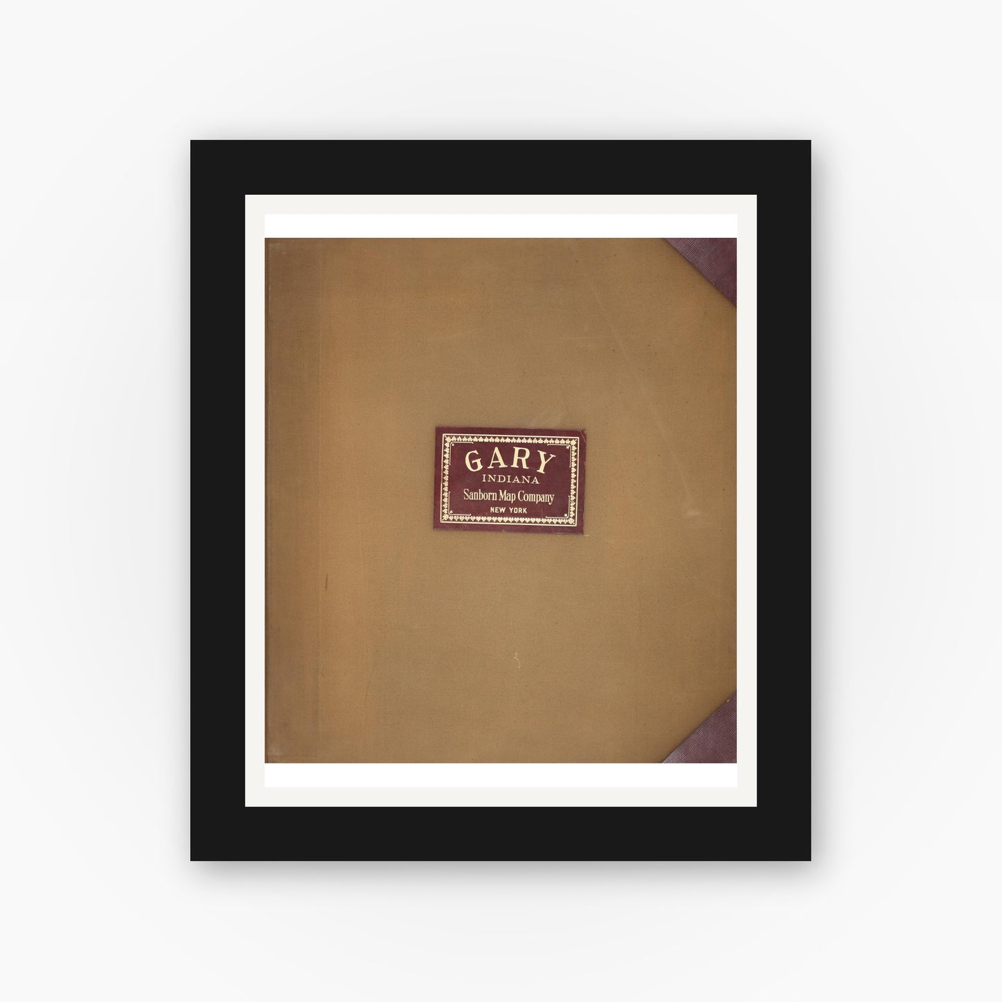 Old map wall art mockup — black gallery frame with white mat — Sanborn Fire Insurance Map from Gary, Lake County, Indiana (1944), Sheet #0001