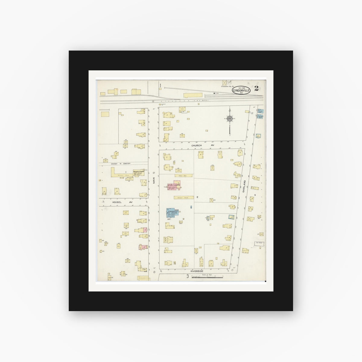 Old map wall art mockup — black gallery frame with white mat — Sanborn Fire Insurance Map from Lyndonville, Orleans County, New York (1914), Sheet #0002