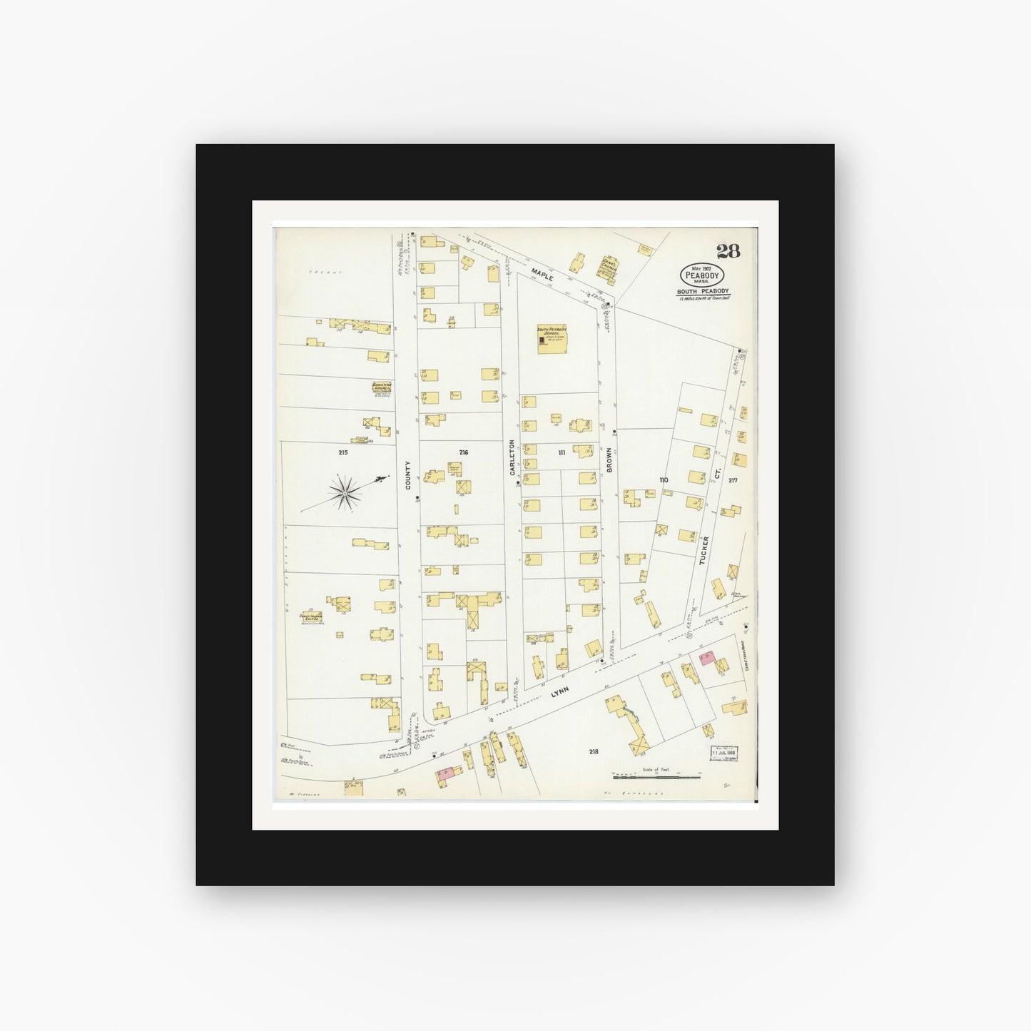 Old map wall art mockup — black gallery frame with white mat — Sanborn Fire Insurance Map from Peabody, Essex County, Massachusetts (1907), Sheet #0028