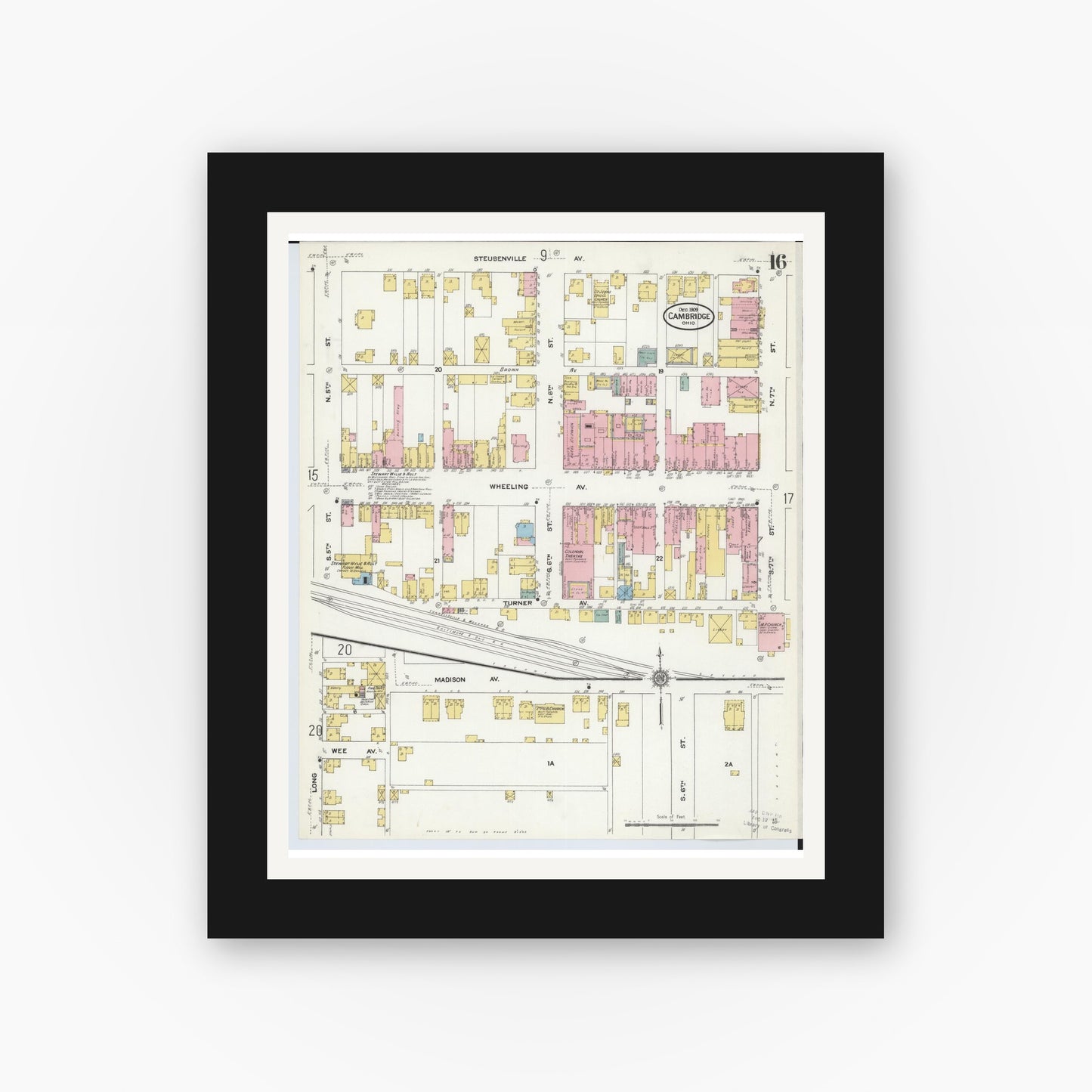 Old map wall art mockup — black gallery frame with white mat — Sanborn Fire Insurance Map from Cambridge, Guernsey County, Ohio (1909), Sheet #0016
