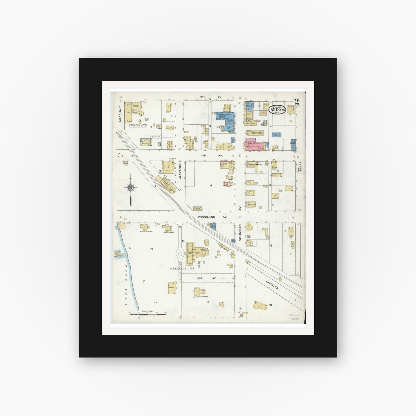Old map wall art mockup — black gallery frame with white mat — Sanborn Fire Insurance Map from Mount Dora, Lake County, Florida (1920), Sheet #0002
