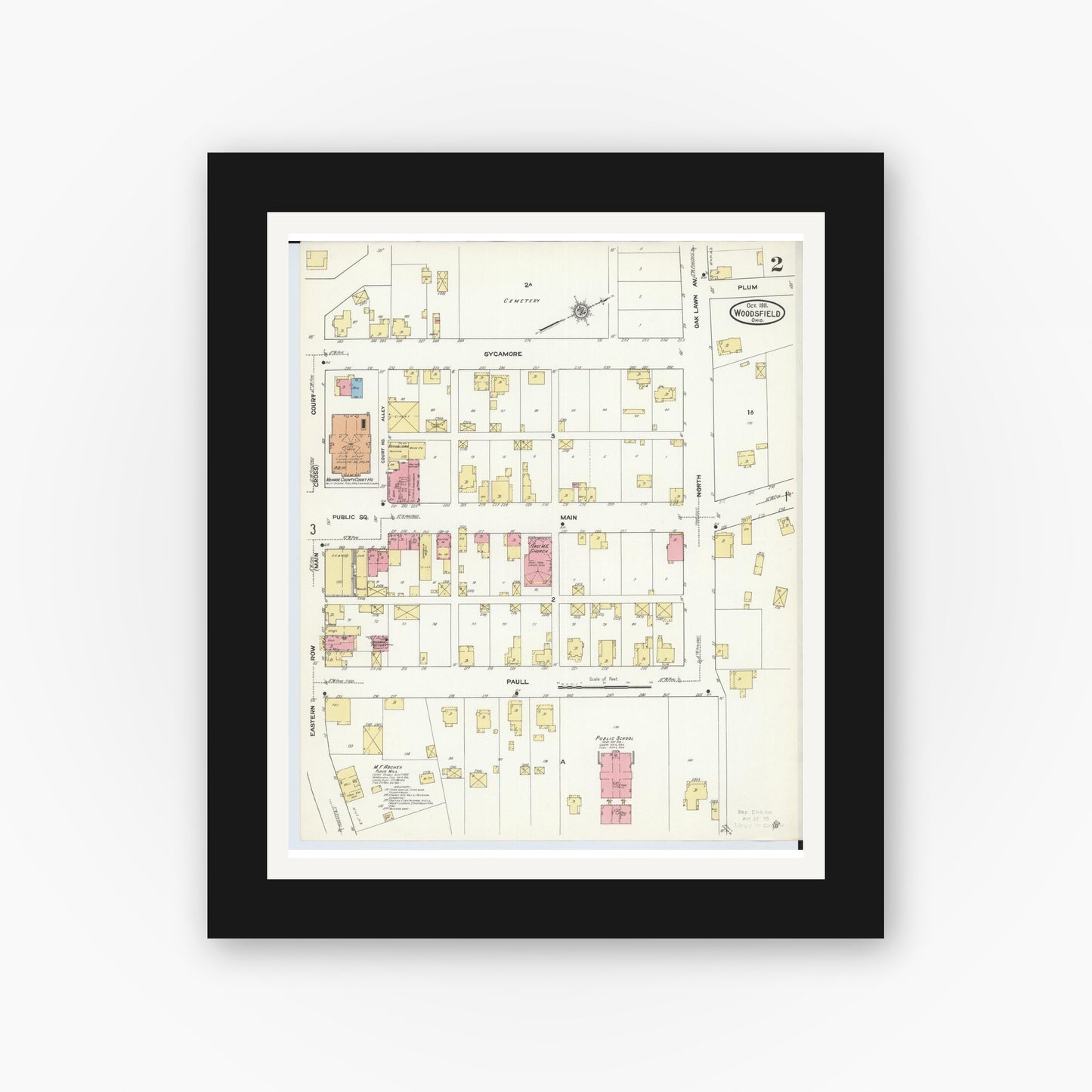 Old map wall art mockup — black gallery frame with white mat — Sanborn Fire Insurance Map from Woodsfield, Monroe County, Ohio (1911), Sheet #0002