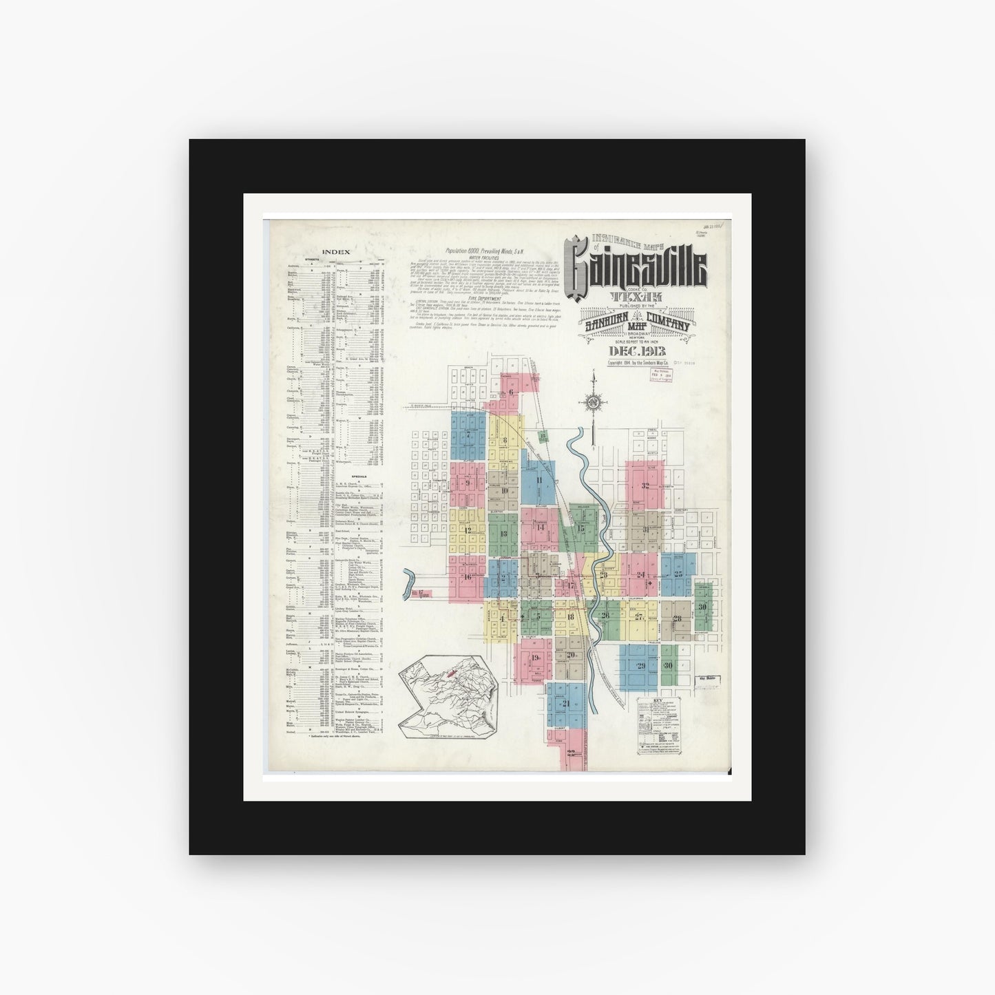 Old map wall art mockup — black gallery frame with white mat — Sanborn Fire Insurance Map from Gainesville, Cooke County, Texas (1913) - Complete Map Set