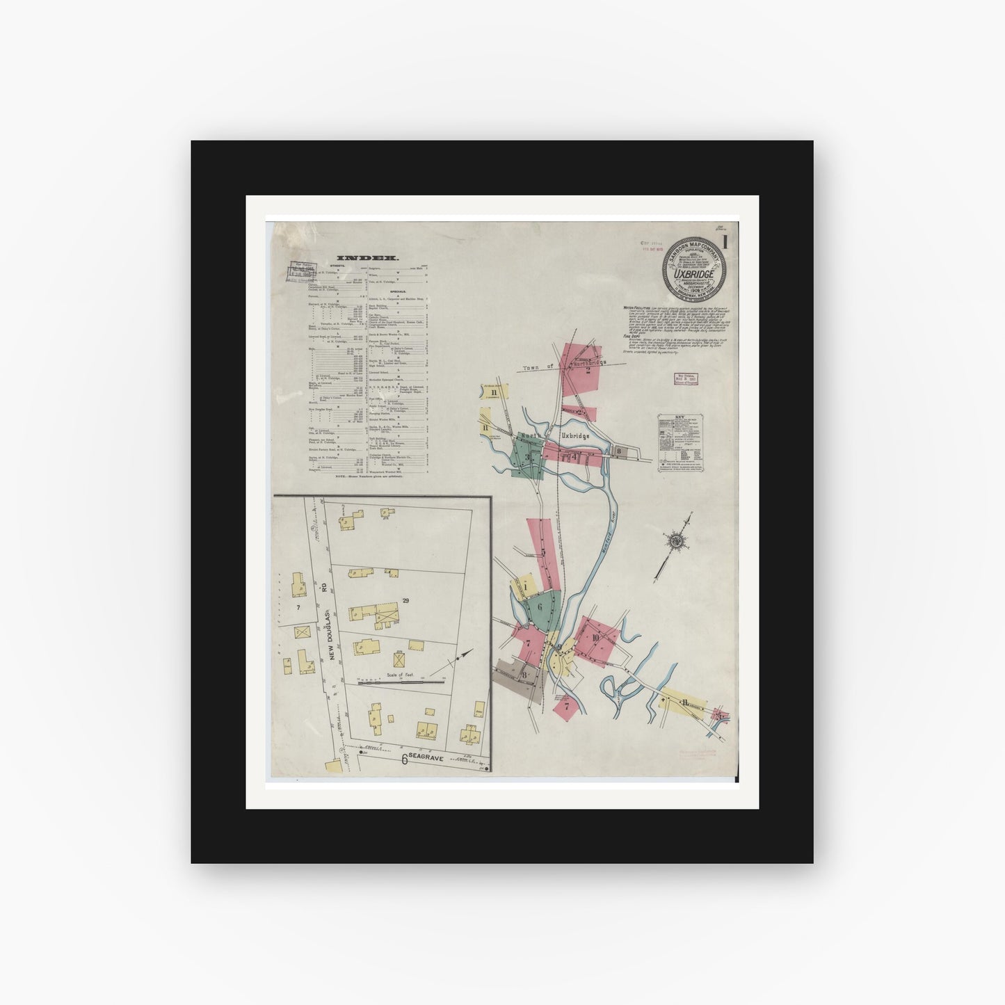 Old map wall art mockup — black gallery frame with white mat — Sanborn Fire Insurance Map from Uxbridge, Worcester County, Massachusetts (1909), Sheet #0001