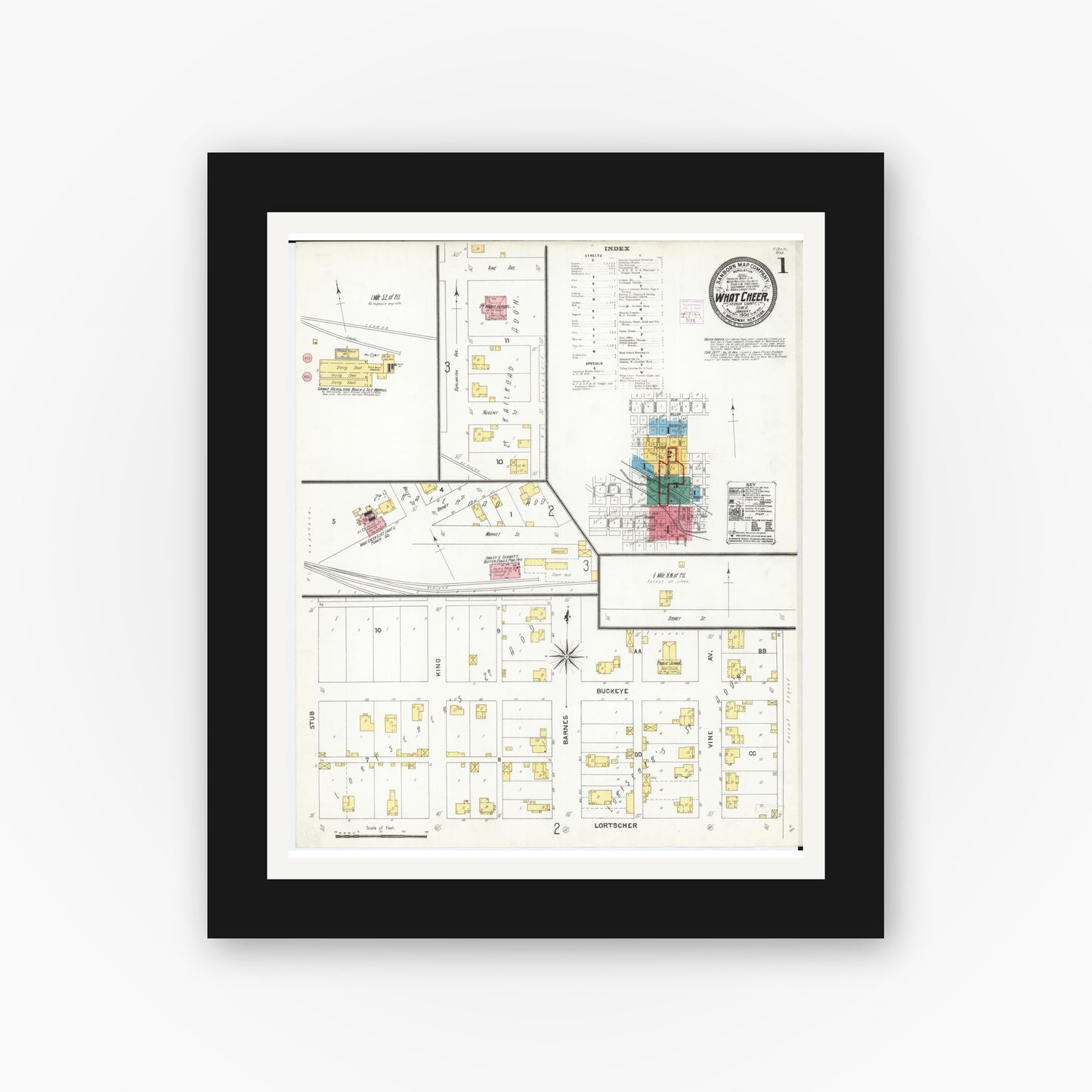 Old map wall art mockup — black gallery frame with white mat — Sanborn Fire Insurance Map from What Cheer, Keokuk County, Iowa (1906), Sheet #0001
