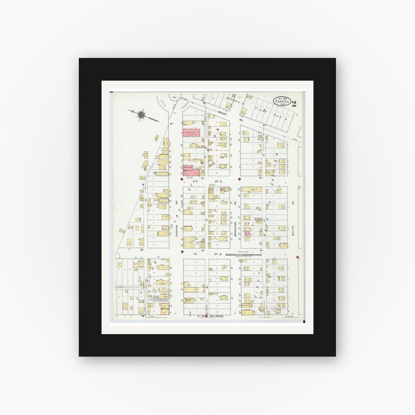 Old map wall art mockup — black gallery frame with white mat — Sanborn Fire Insurance Map from Caspian, Iron County, Michigan (1922), Sheet #0002