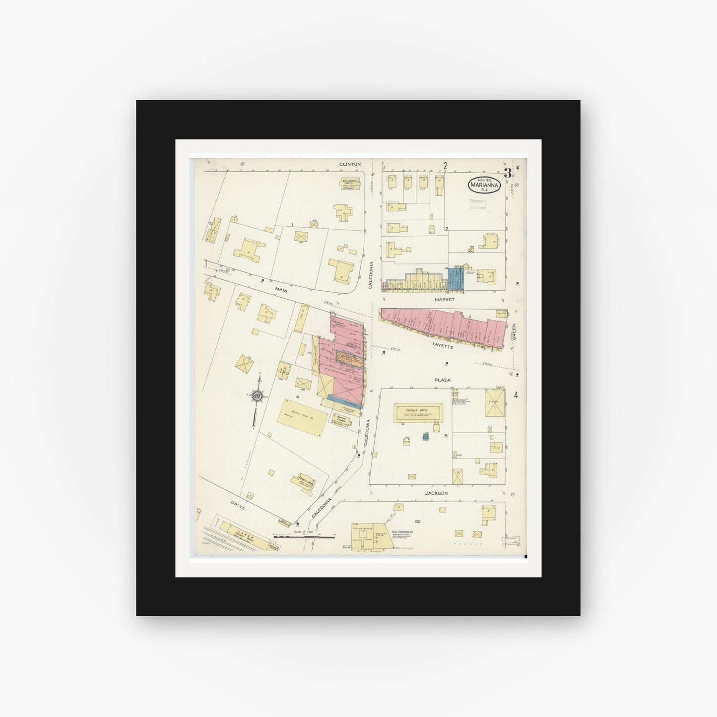 Old map wall art mockup — black gallery frame with white mat — Sanborn Fire Insurance Map from Marianna, Jackson County, Florida (1913), Sheet #0003