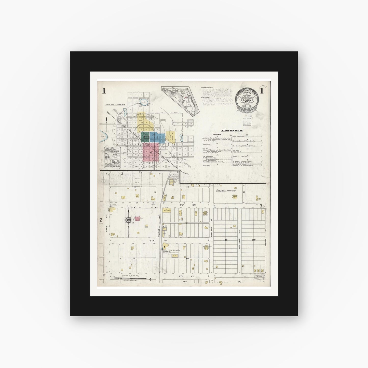 Old map wall art mockup — black gallery frame with white mat — Sanborn Fire Insurance Map from Apopka, Orange County, Florida (1924), Sheet #0001