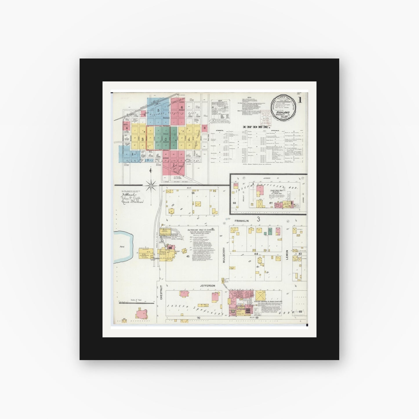 Old map wall art mockup — black gallery frame with white mat — Sanborn Fire Insurance Map from Highland, Madison County, Illinois (1899), Sheet #0001