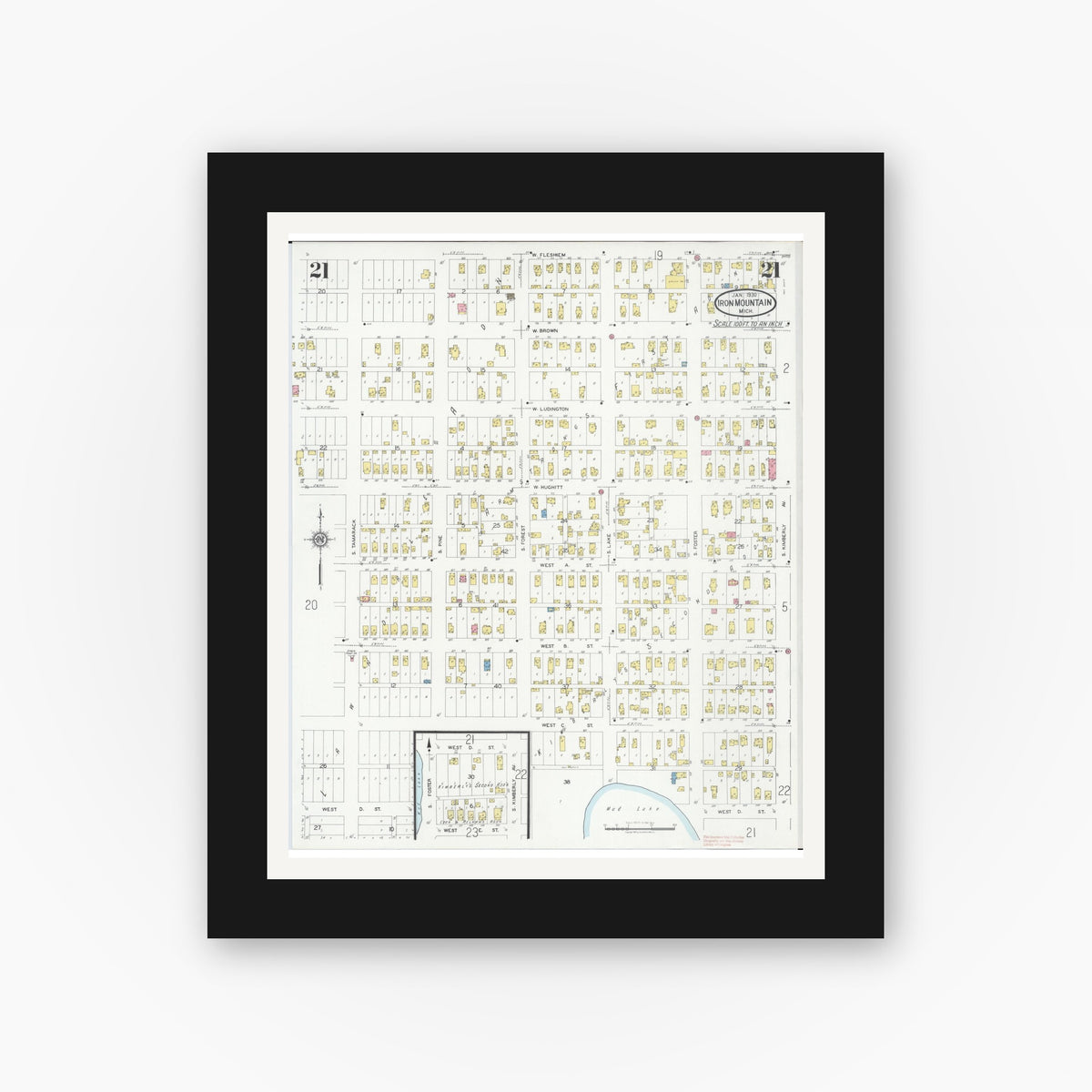 Old map wall art mockup — black gallery frame with white mat — Sanborn Fire Insurance Map from Iron Mountain, Dickinson County, Michigan (1930), Sheet #0021