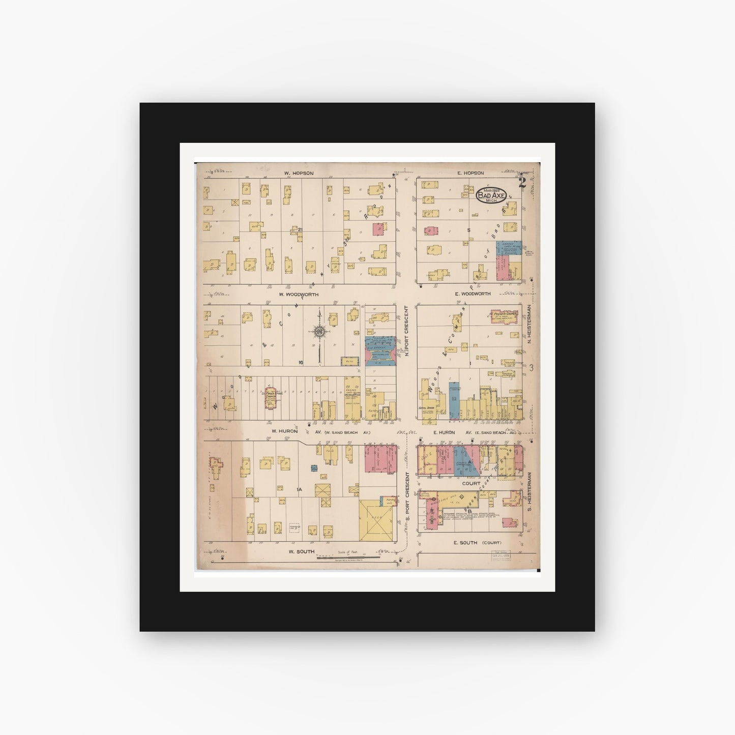 Old map wall art mockup — black gallery frame with white mat — Sanborn Fire Insurance Map from Bad Axe, Huron County, Michigan (1922), Sheet #0002
