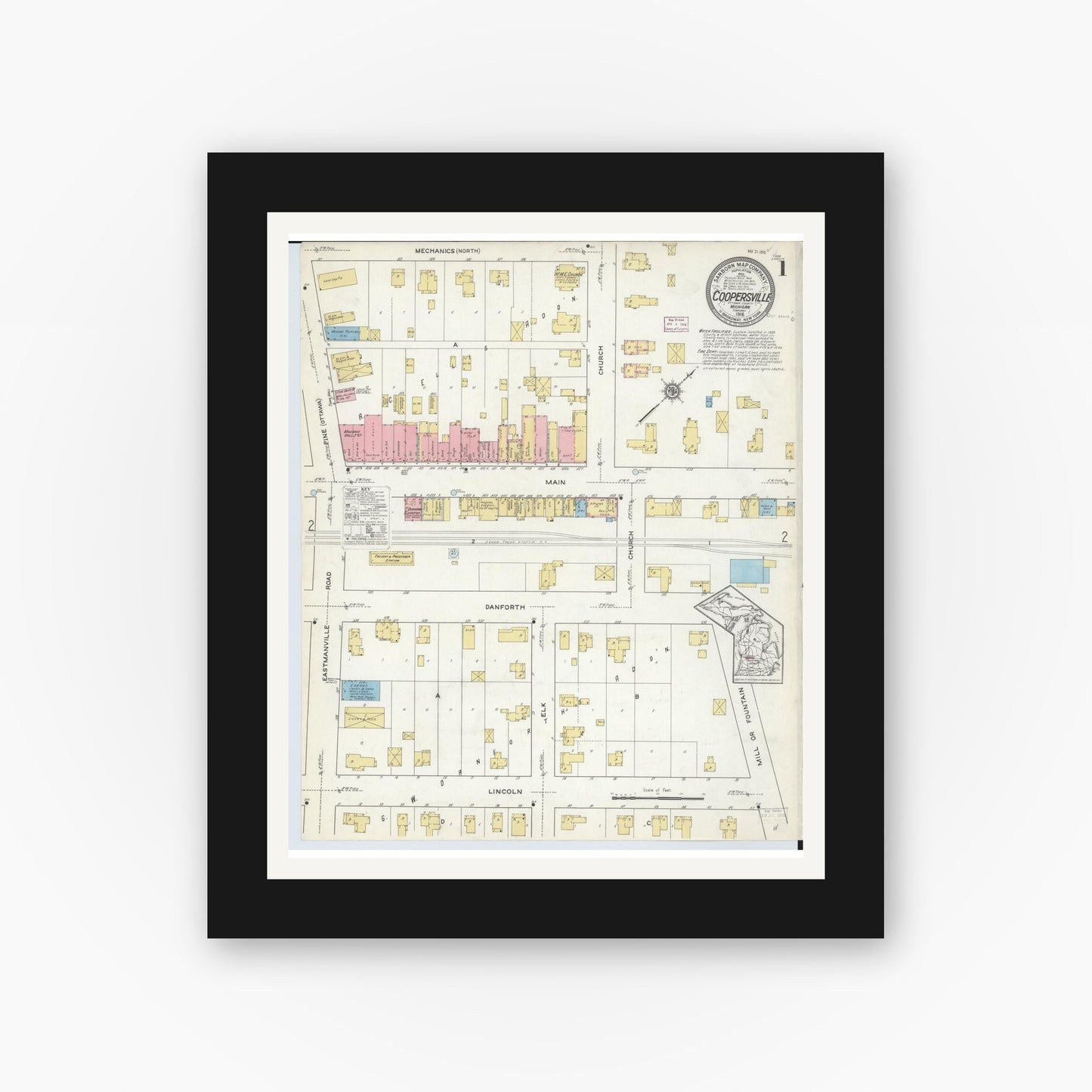 Old map wall art mockup — black gallery frame with white mat — Sanborn Fire Insurance Map from Coopersville, Ottawa County, Michigan (1916), Sheet #0001