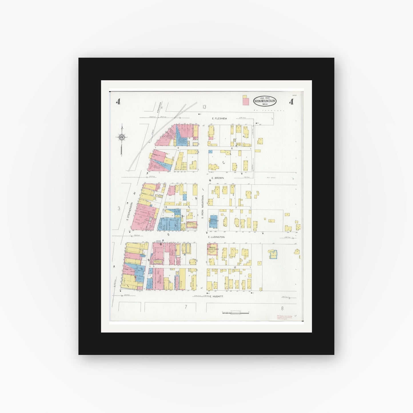 Old map wall art mockup — black gallery frame with white mat — Sanborn Fire Insurance Map from Iron Mountain, Dickinson County, Michigan (1930), Sheet #0004