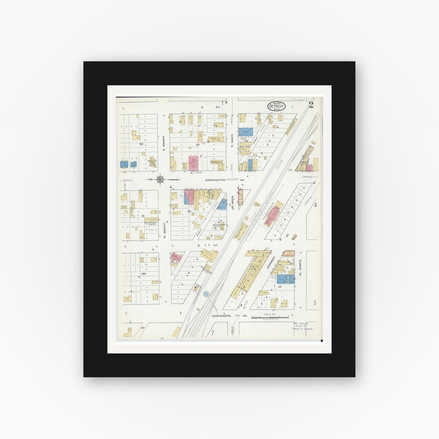 Old map wall art mockup — black gallery frame with white mat — Sanborn Fire Insurance Map from Detroit Lakes, Becker County, Minnesota (1917), Sheet #0002