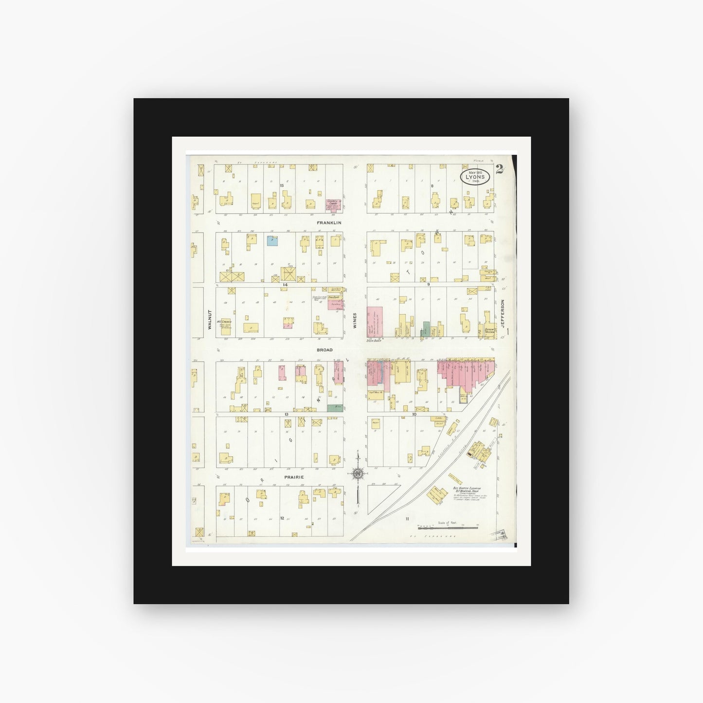 Old map wall art mockup — black gallery frame with white mat — Sanborn Fire Insurance Map from Lyons, Greene County, Indiana (1910), Sheet #0002