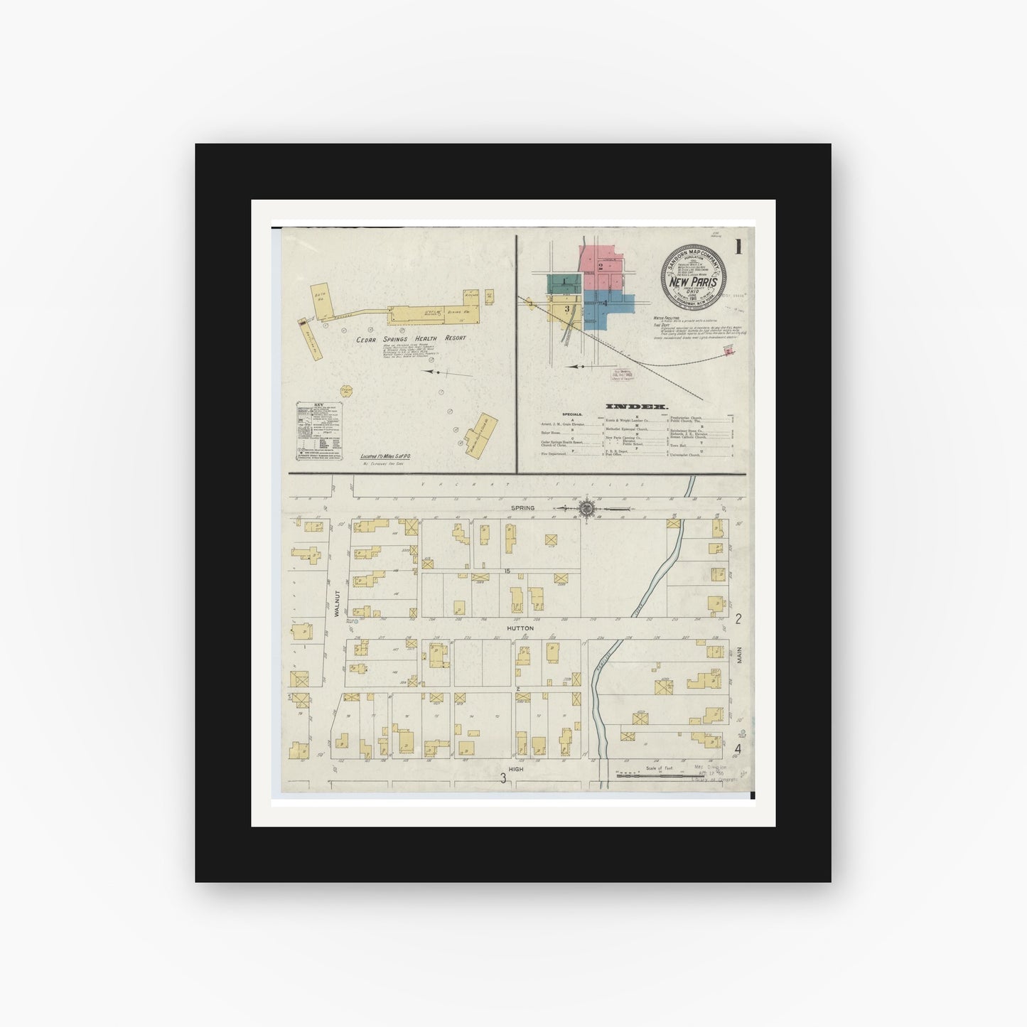 Old map wall art mockup — black gallery frame with white mat — Sanborn Fire Insurance Map from New Paris, Preble County, Ohio (1911), Sheet #0001
