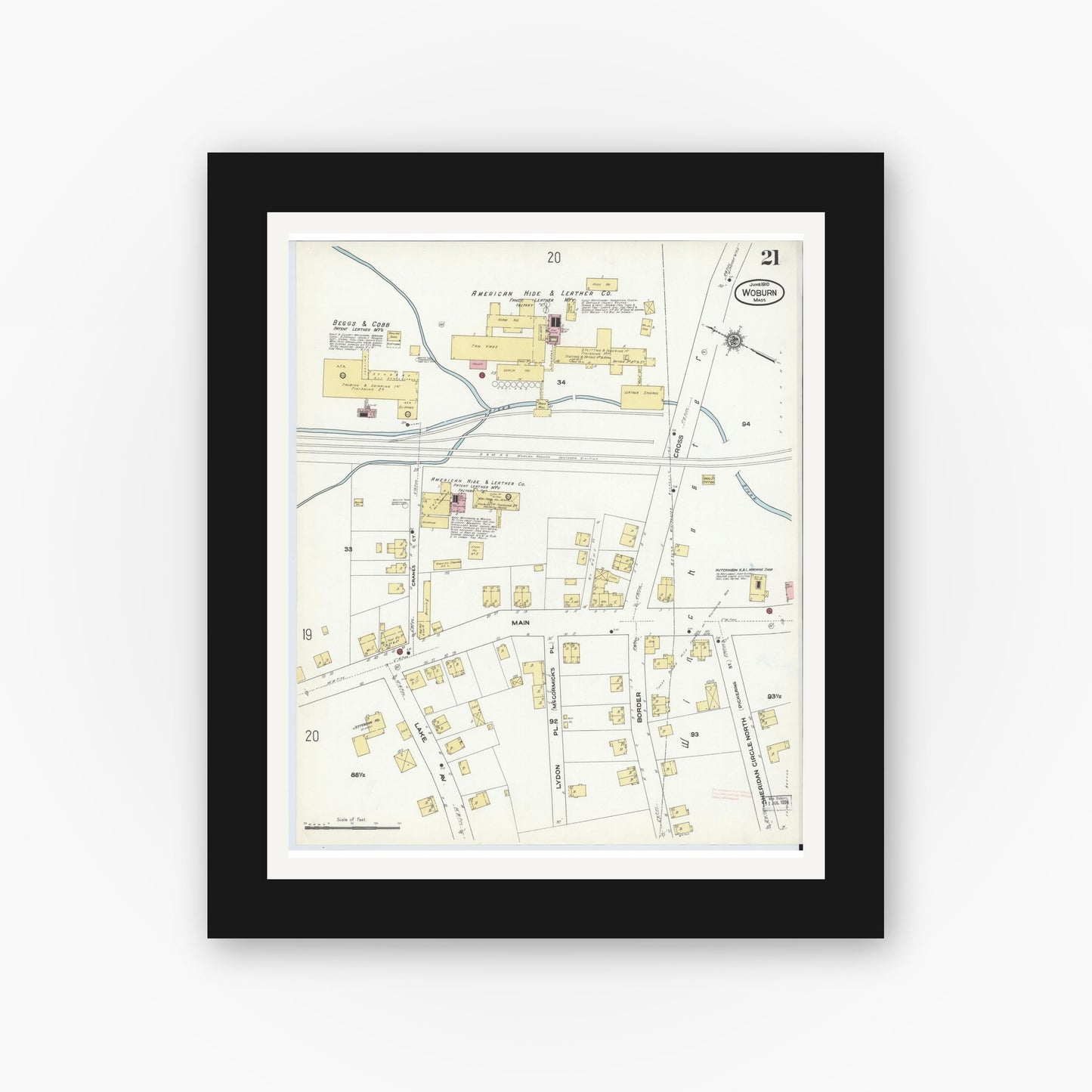 Old map wall art mockup — black gallery frame with white mat — Sanborn Fire Insurance Map from Woburn, Middlesex County, Massachusetts (1910), Sheet #0021