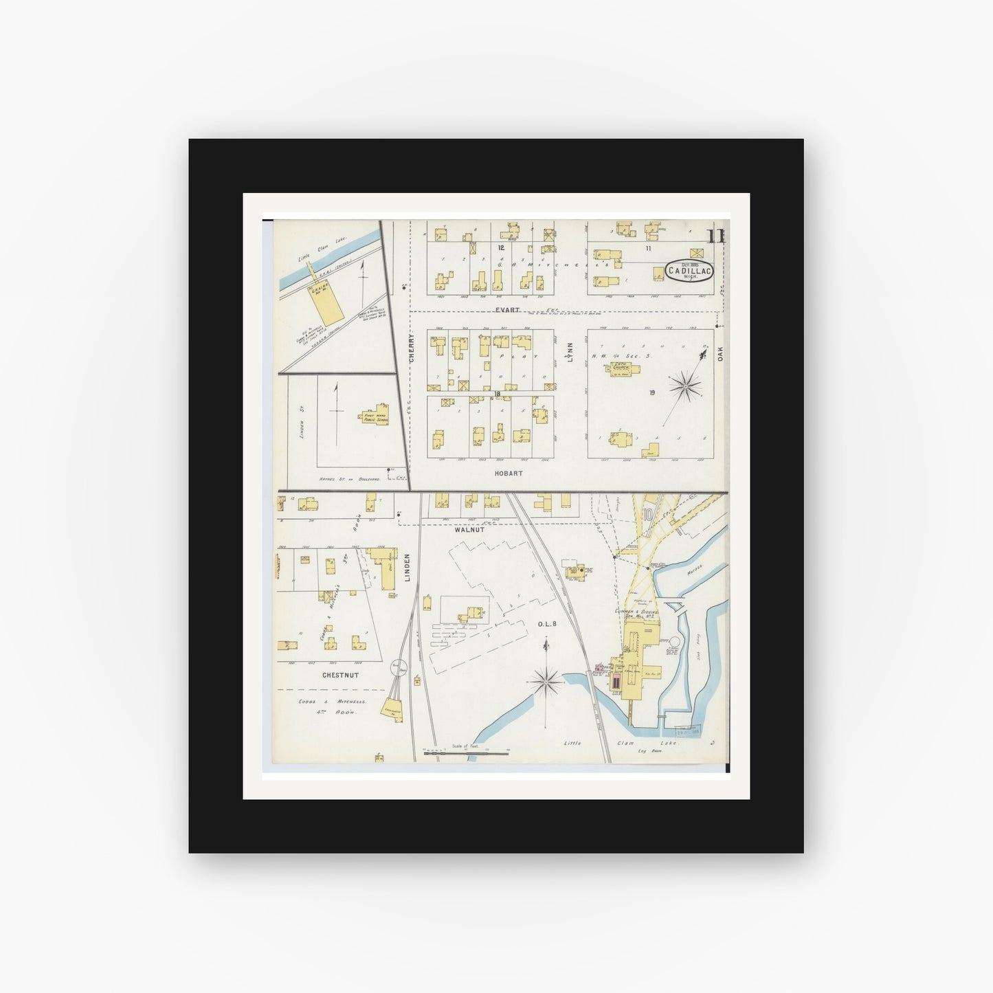 Old map wall art mockup — black gallery frame with white mat — Sanborn Fire Insurance Map from Cadillac, Wexford County, Michigan (1895), Sheet #0011