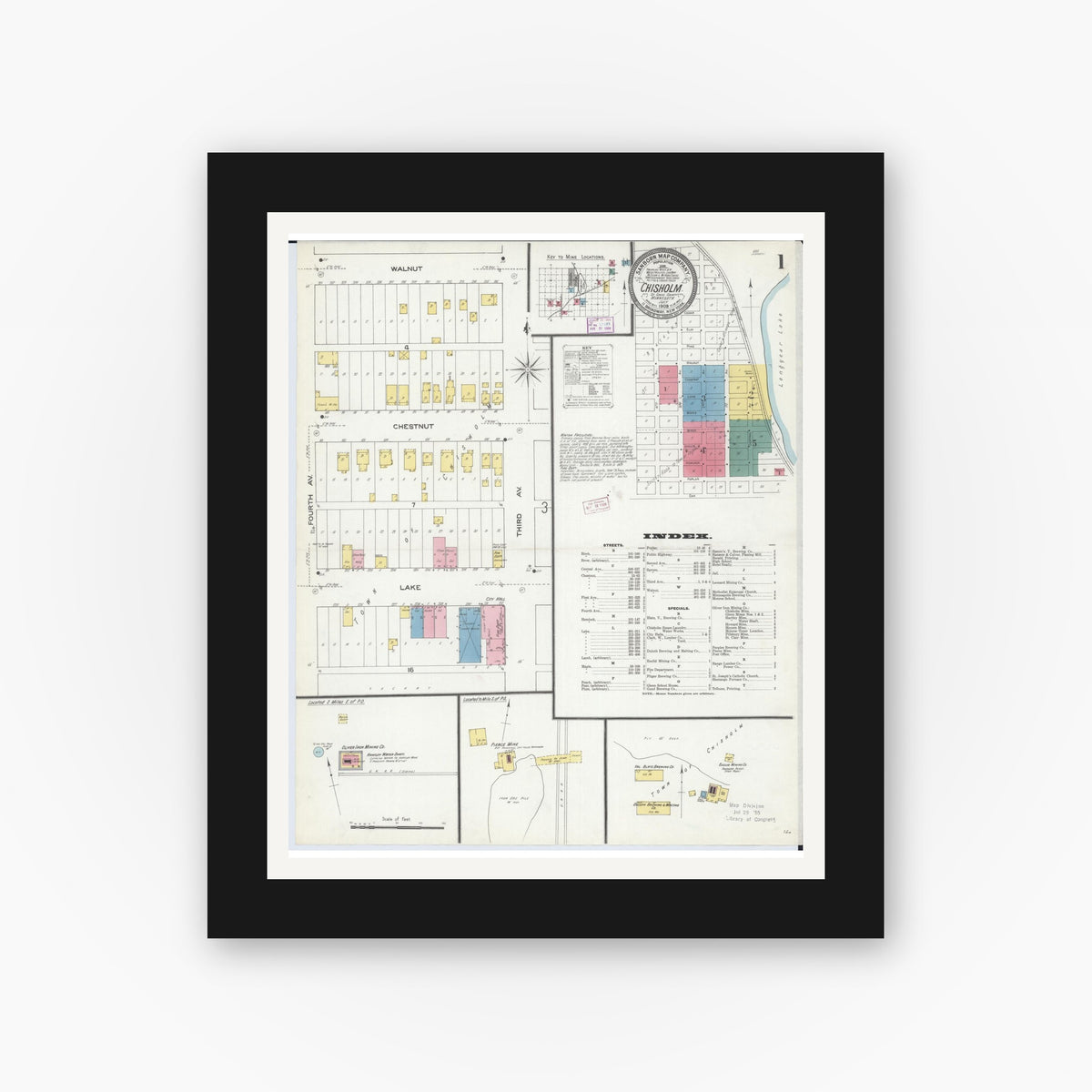 Old map wall art mockup — black gallery frame with white mat — Sanborn Fire Insurance Map from Chisholm, Saint Louis County, Minnesota (1909) - Complete Map Set