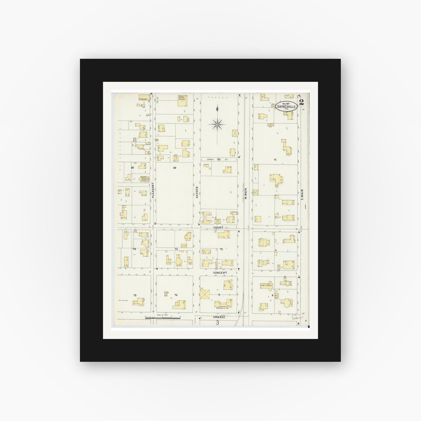 Old map wall art mockup — black gallery frame with white mat — Sanborn Fire Insurance Map from Gainesville, Alachua County, Florida (1897), Sheet #0002