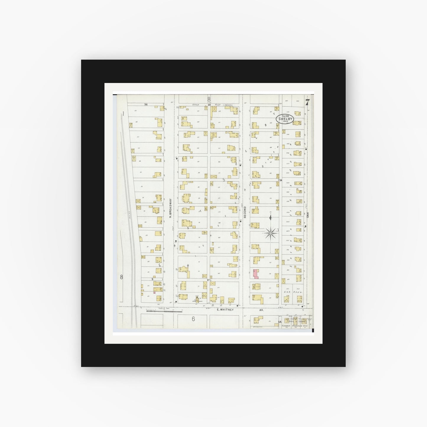 Old map wall art mockup — black gallery frame with white mat — Sanborn Fire Insurance Map from Shelby, Richland County, Ohio (1899), Sheet #0007