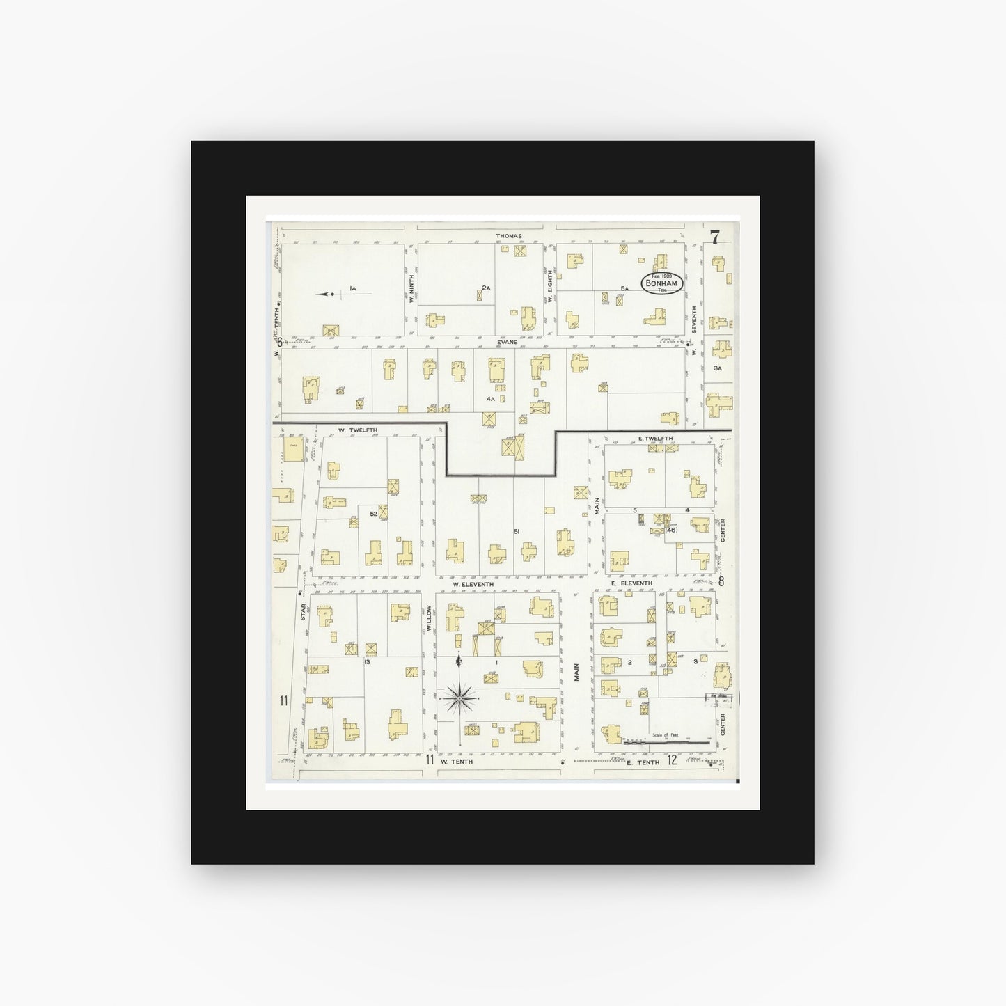 Old map wall art mockup — black gallery frame with white mat — Sanborn Fire Insurance Map from Bonham, Fannin County, Texas (1909), Sheet #0007