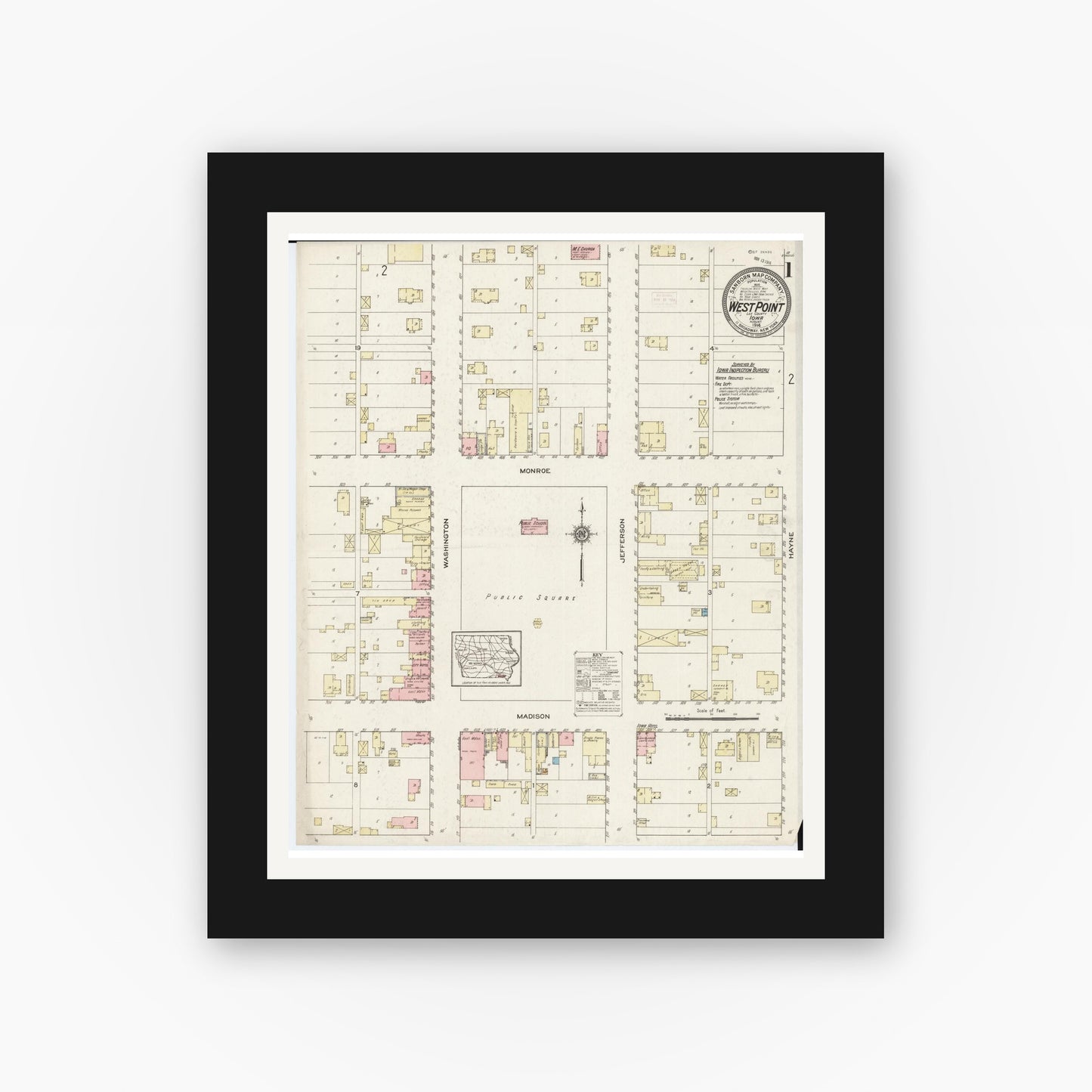 Old map wall art mockup — black gallery frame with white mat — Sanborn Fire Insurance Map from West Point, Lee County, Iowa (1914) — Complete Set