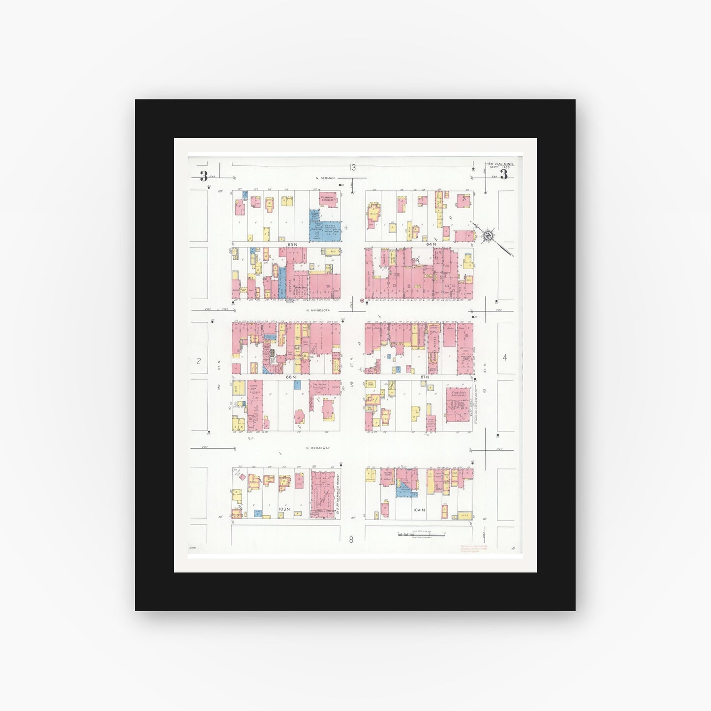 Old map wall art mockup — black gallery frame with white mat — Sanborn Fire Insurance Map from New Ulm, Brown County, Minnesota (1935), Sheet #0003