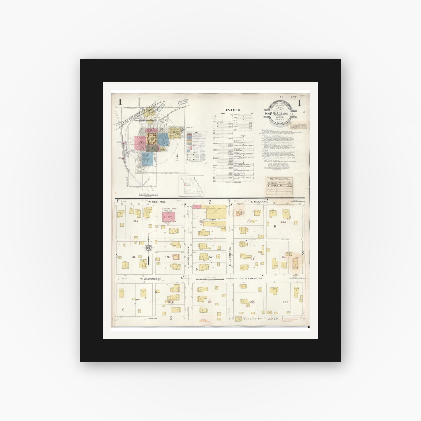 Old map wall art mockup — black gallery frame with white mat — Sanborn Fire Insurance Map from Harrisonville, Cass County, Missouri (1939), Sheet #0001