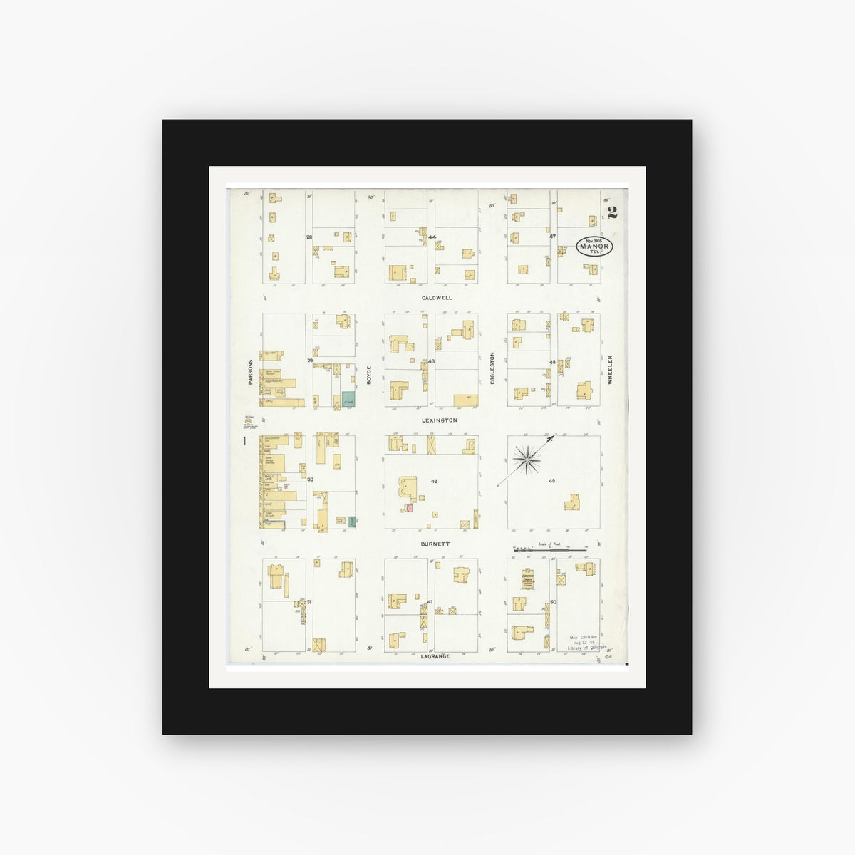 Old map wall art mockup — black gallery frame with white mat — Sanborn Fire Insurance Map from Manor, Travis County, Texas (1905), Sheet #0002