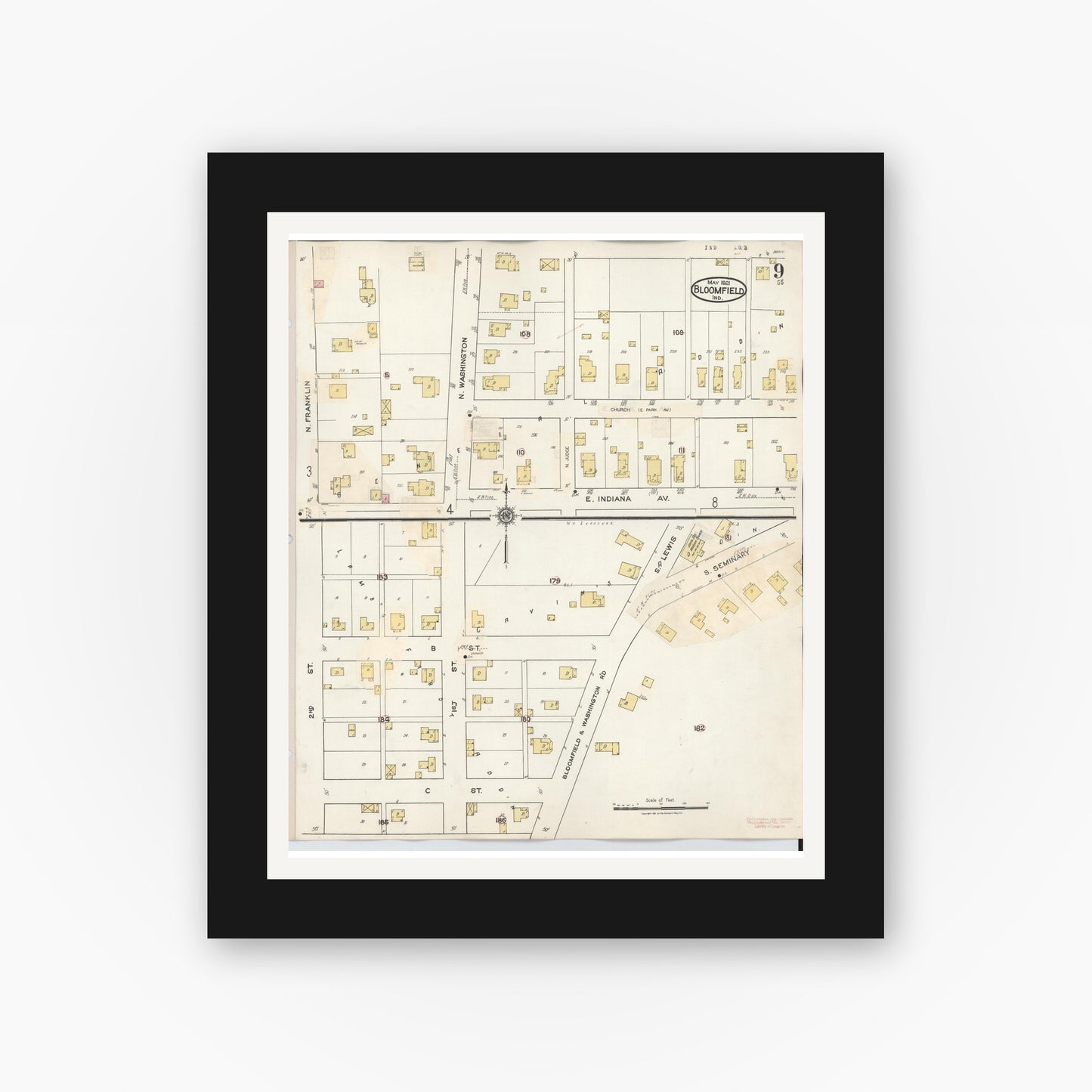 Old map wall art mockup — black gallery frame with white mat — Sanborn Fire Insurance Map from Bloomfield, Greene County, Indiana (1940), Sheet #0009