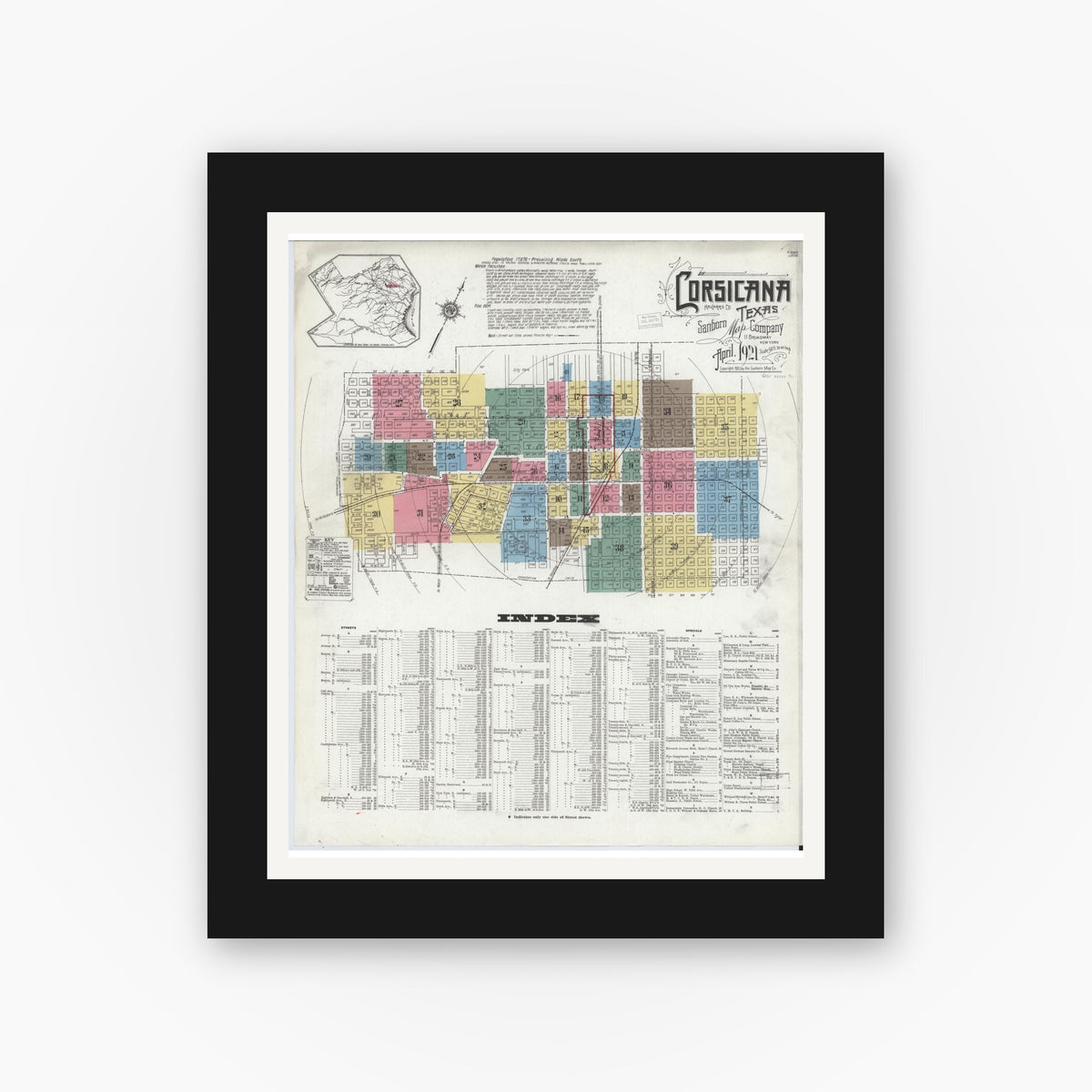Old map wall art mockup — black gallery frame with white mat — Sanborn Fire Insurance Map from Corsicana, Navarro County, Texas (1921) - Complete Map Set