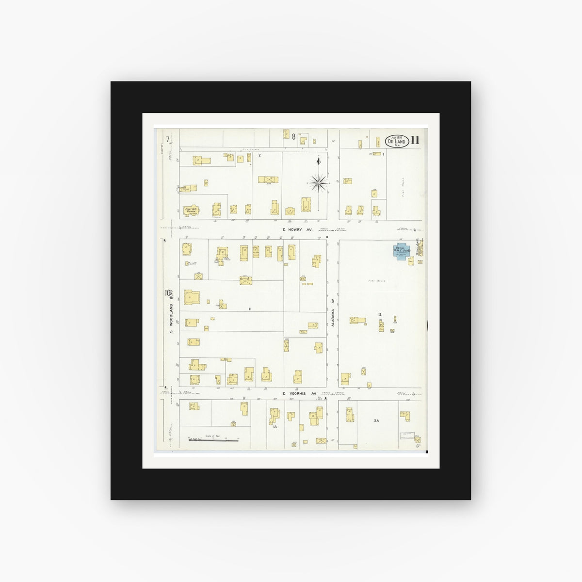 Old map wall art mockup — black gallery frame with white mat — Sanborn Fire Insurance Map from De Land, Volusia County, Florida (1909), Sheet #0011