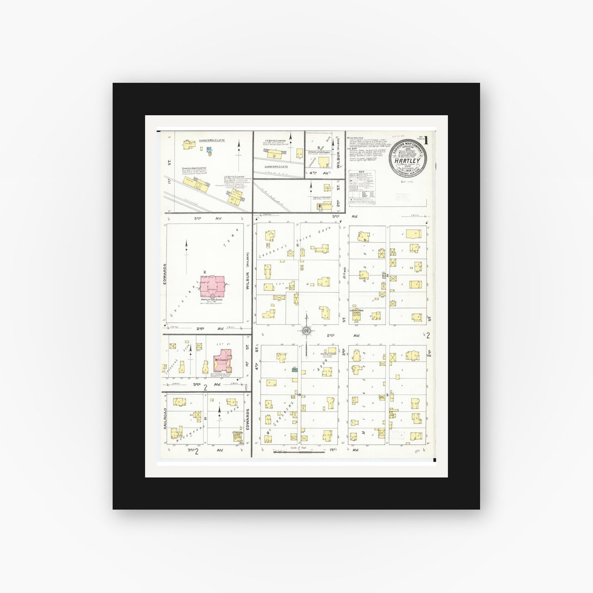 Old map wall art mockup — black gallery frame with white mat — Sanborn Fire Insurance Map from Hartley, O'Brien County, Iowa (1909), Sheet #0001