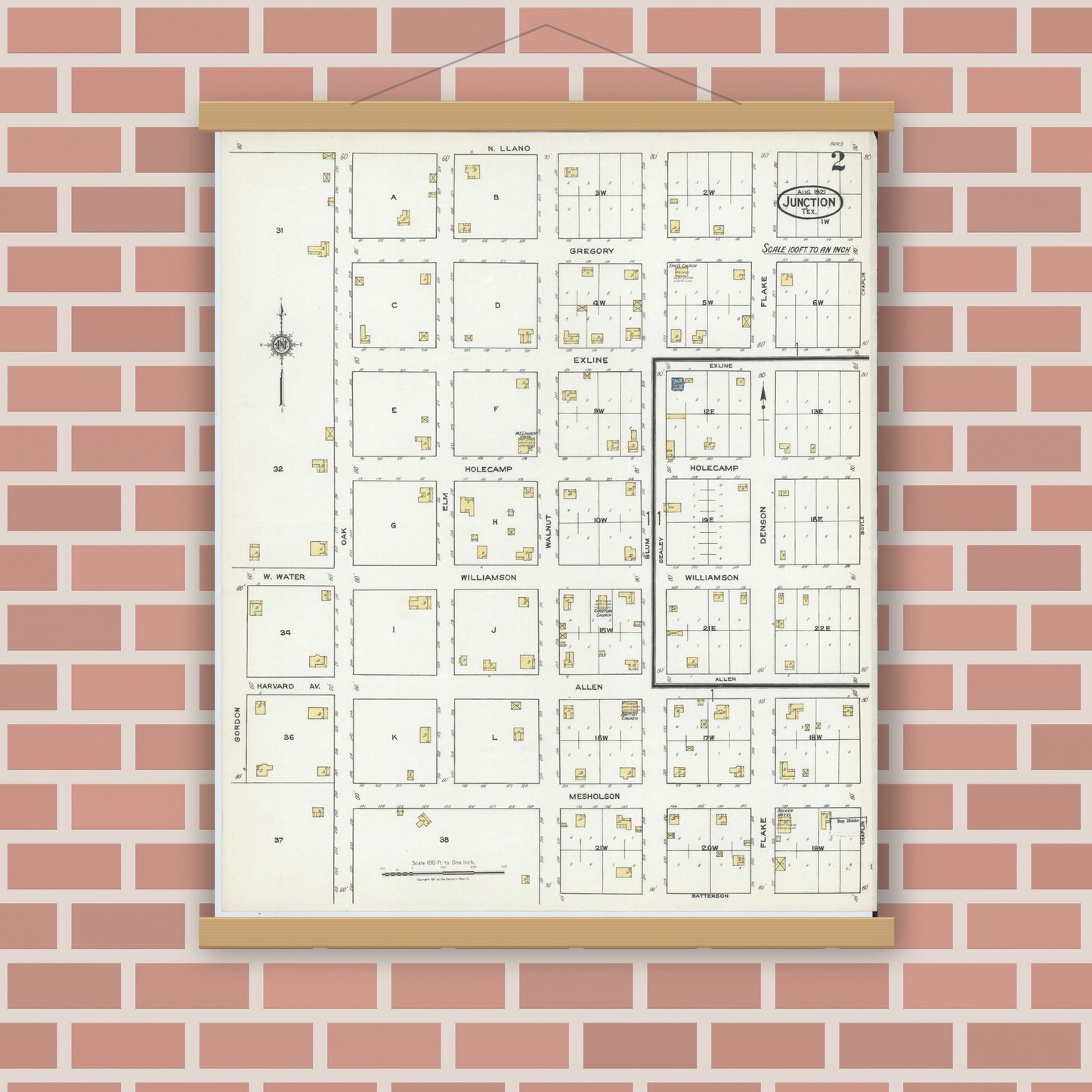 Old map wall art mockup — magnetic wood frame on brick wall — Sanborn Fire Insurance Map from Junction, Kimble County, Texas (1921), Sheet #0002