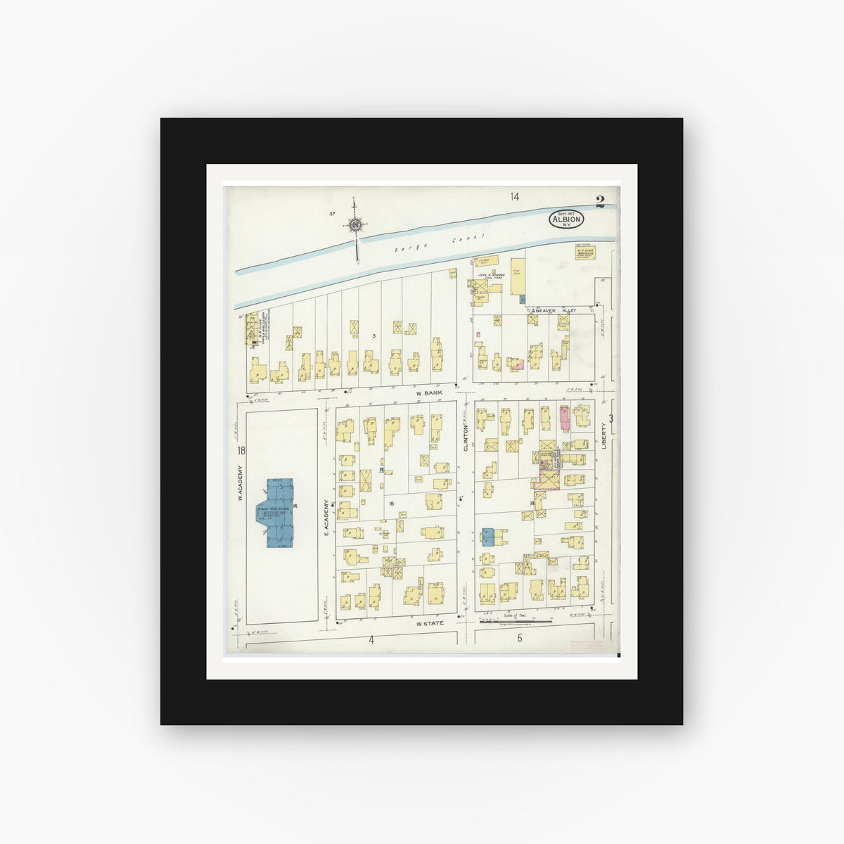 Old map wall art mockup — black gallery frame with white mat — Sanborn Fire Insurance Map from Albion, Orleans County, New York (1917) - Complete Map Set