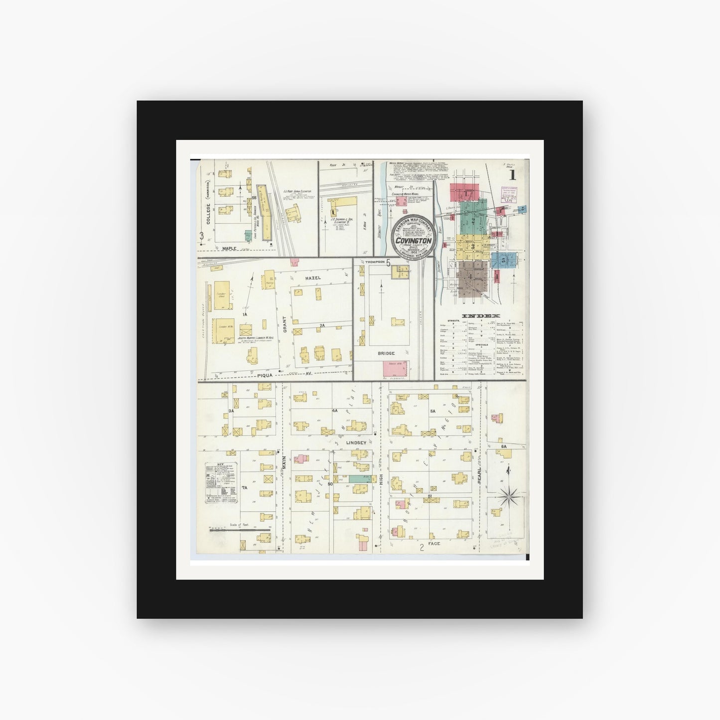 Old map wall art mockup — black gallery frame with white mat — Sanborn Fire Insurance Map from Covington, Miami County, Ohio (1905) - Complete Map Set