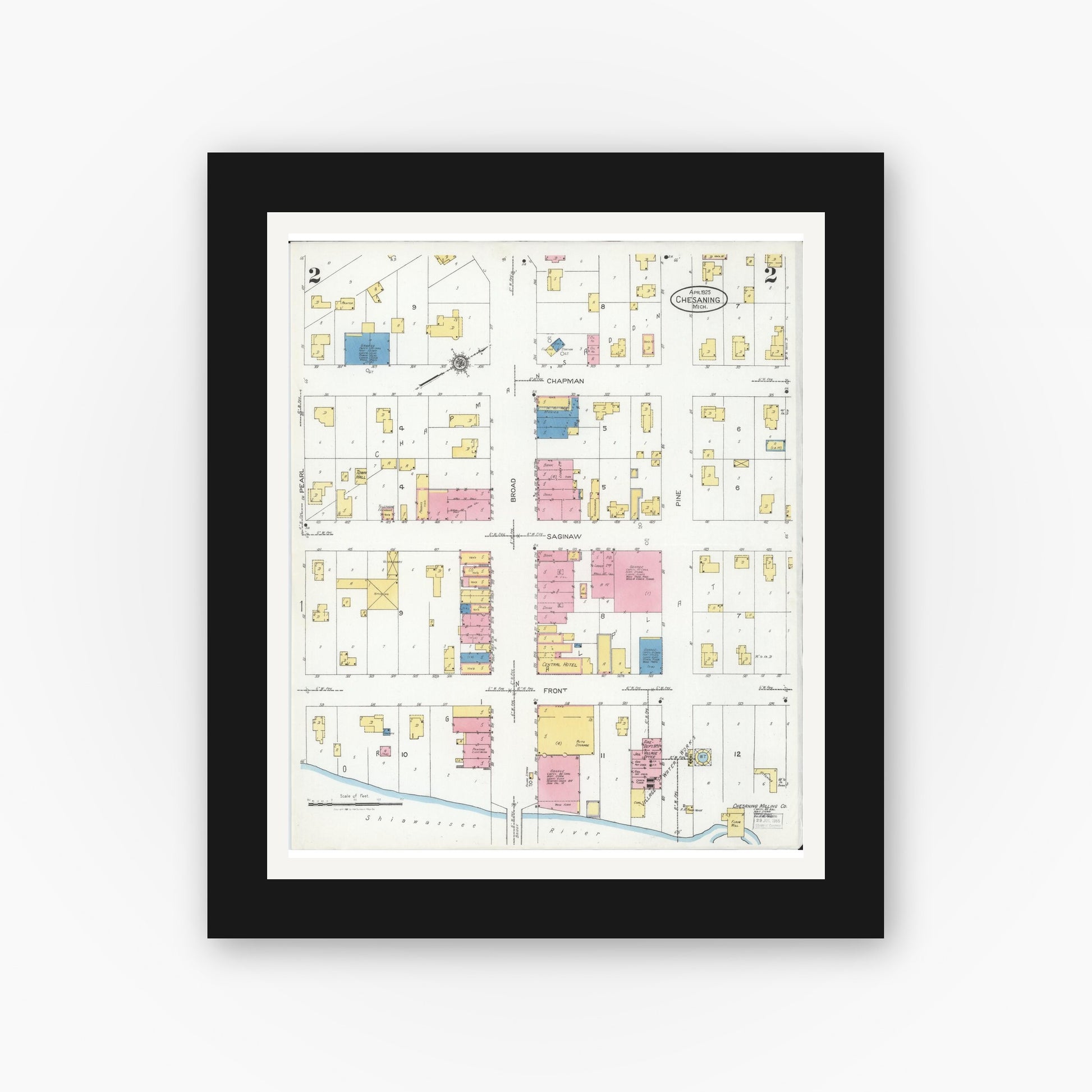 Old map wall art mockup — black gallery frame with white mat — Sanborn Fire Insurance Map from Chesaning, Saginaw County, Michigan (1925), Sheet #0002