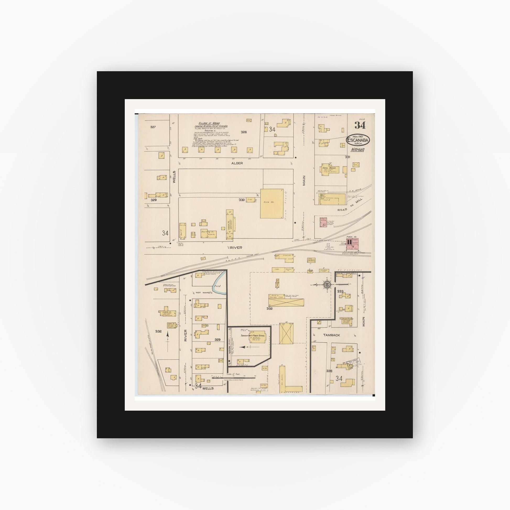 Old map wall art mockup — black gallery frame with white mat — Sanborn Fire Insurance Map from Escanaba, Delta County, Michigan (1921), Sheet #0034