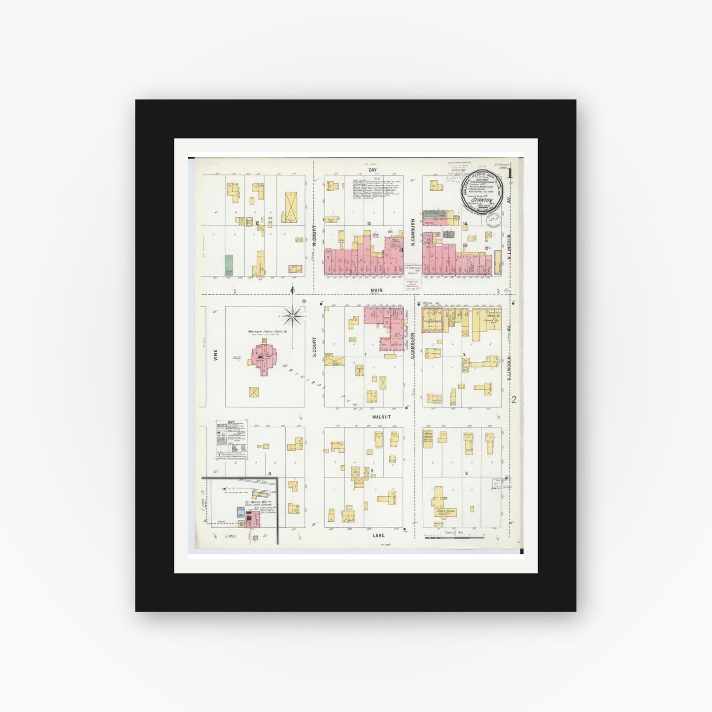 Old map wall art mockup — black gallery frame with white mat — Sanborn Fire Insurance Map from Stanton, Montcalm County, Michigan (1900) - Complete Map Set