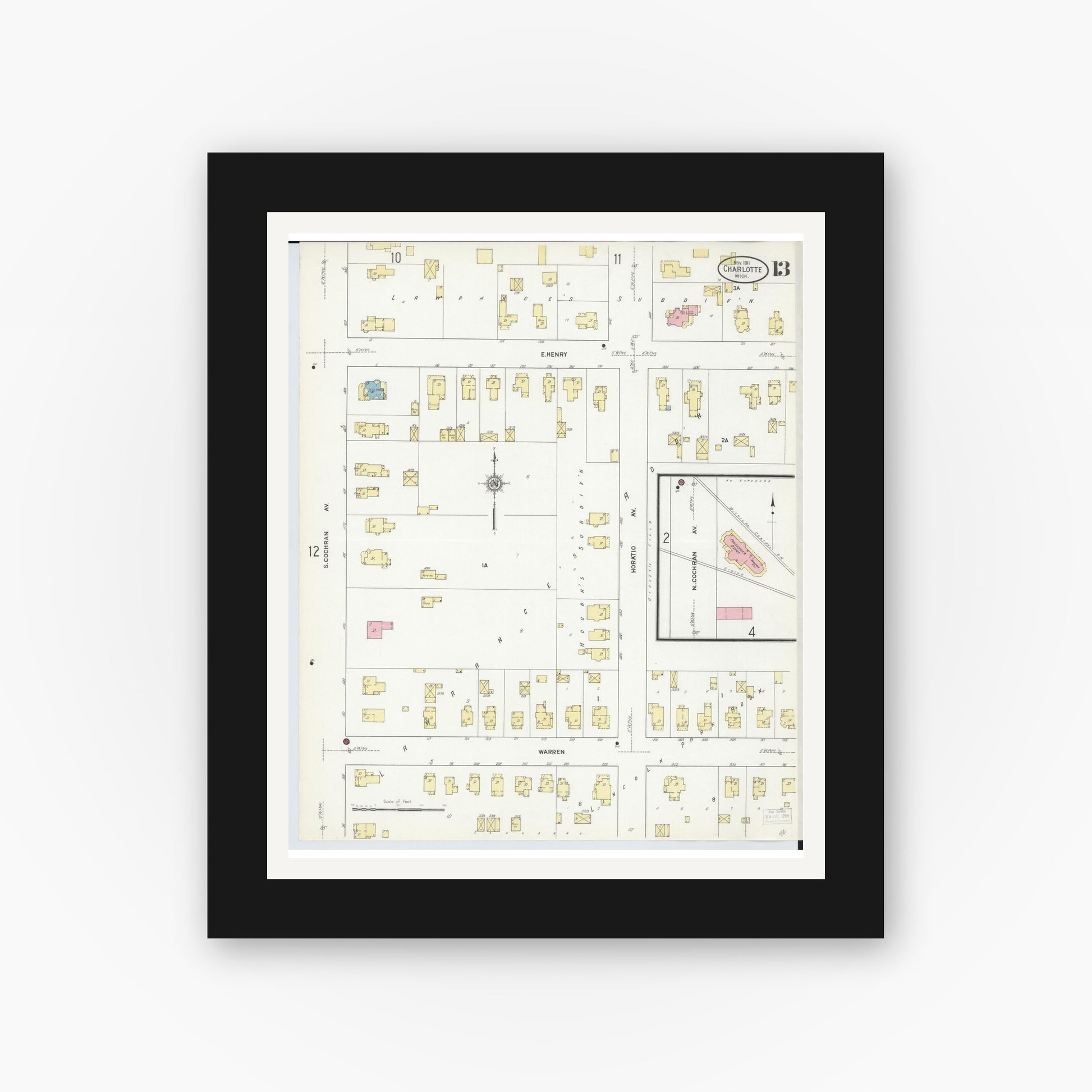 Old map wall art mockup — black gallery frame with white mat — Sanborn Fire Insurance Map from Charlotte, Eaton County, Michigan (1911), Sheet #0013