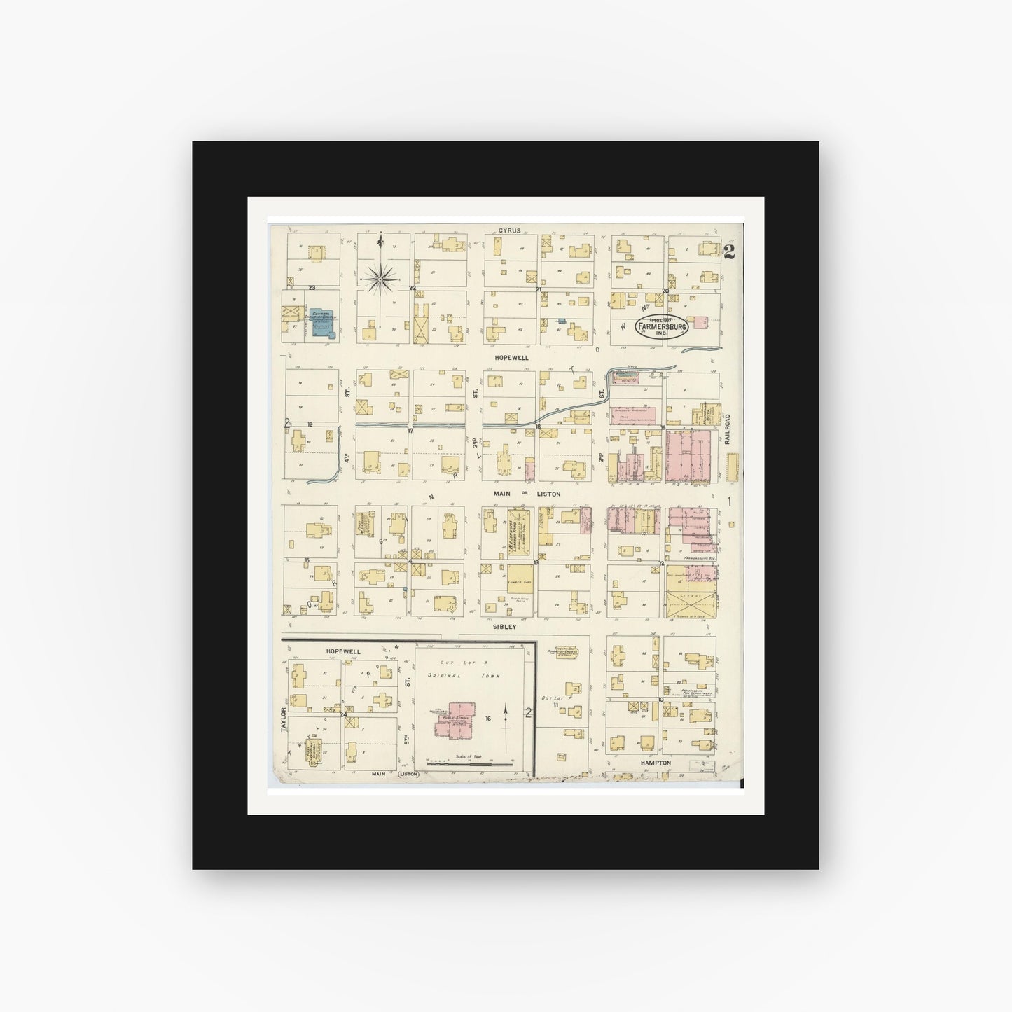 Old map wall art mockup — black gallery frame with white mat — Sanborn Fire Insurance Map from Farmland, Randolph County, Indiana (1907), Sheet #0002