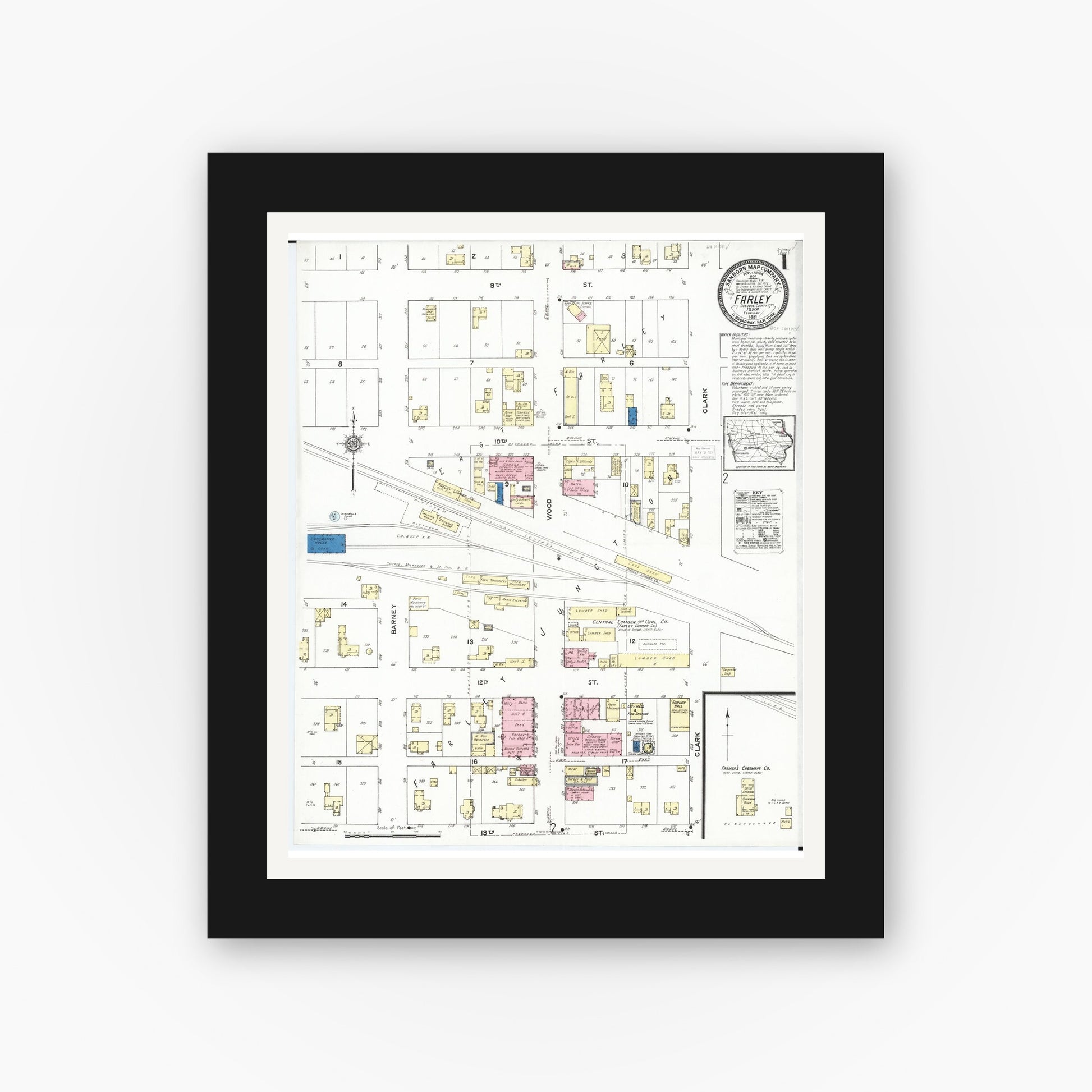 Old map wall art mockup — black gallery frame with white mat — Sanborn Fire Insurance Map from Farley, Dubuque County, Iowa (1921) â€” Complete Set