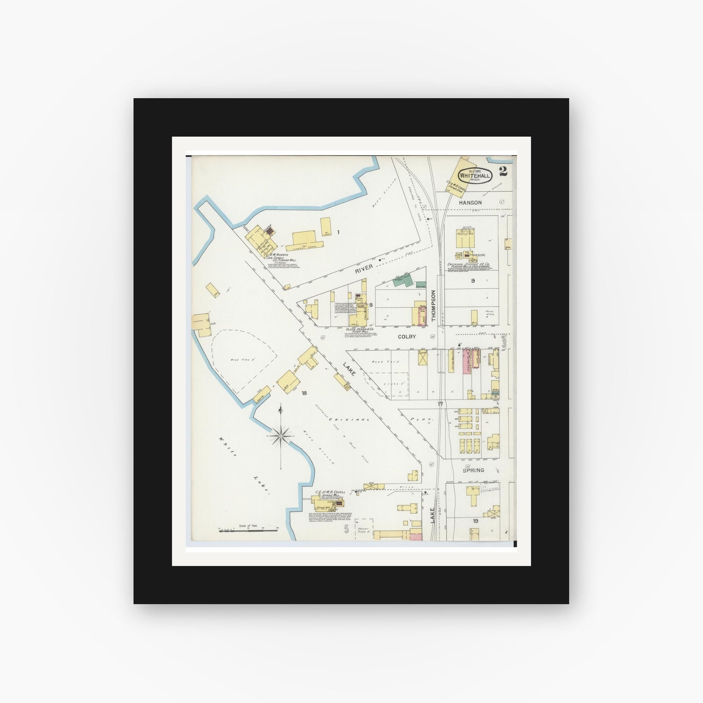 Old map wall art mockup — black gallery frame with white mat — Sanborn Fire Insurance Map from Whitehall, Muskegon County, Michigan (1892), Sheet #0002