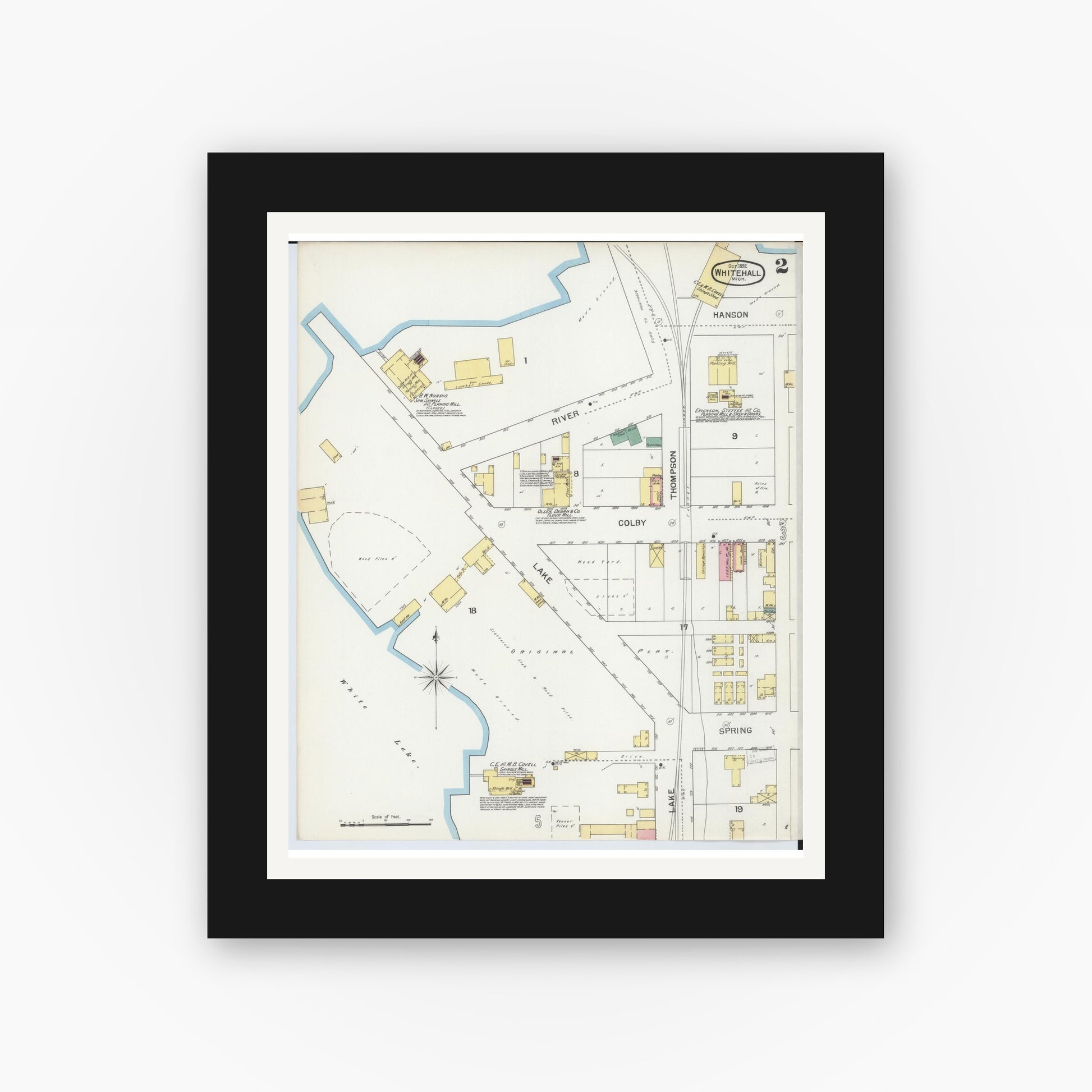 Old map wall art mockup — black gallery frame with white mat — Sanborn Fire Insurance Map from Whitehall, Muskegon County, Michigan (1892), Sheet #0002