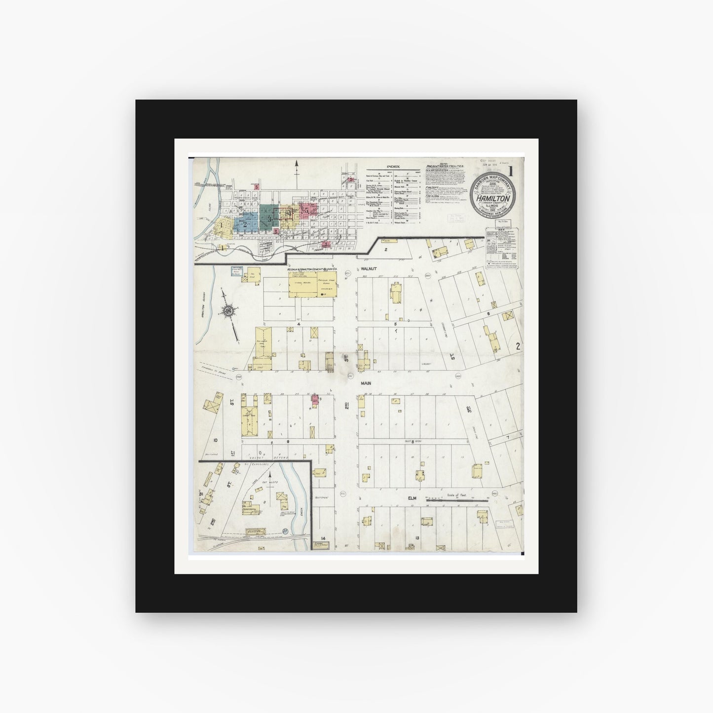 Old map wall art mockup — black gallery frame with white mat — Sanborn Fire Insurance Map from Hamilton, Hancock County, Illinois (1912), Sheet #0001