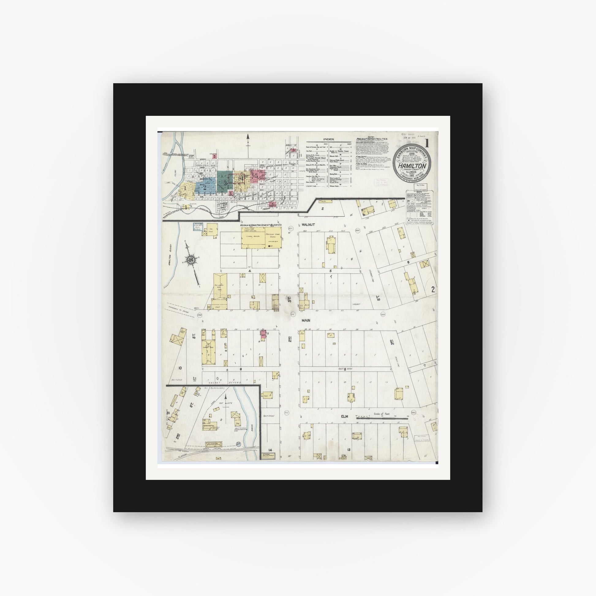 Old map wall art mockup — black gallery frame with white mat — Sanborn Fire Insurance Map from Hamilton, Hancock County, Illinois (1912), Sheet #0001
