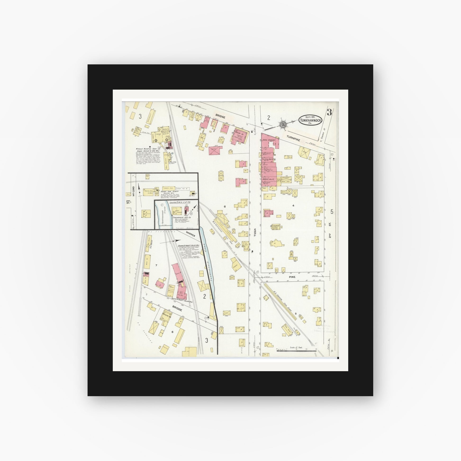 Old map wall art mockup — black gallery frame with white mat — Sanborn Fire Insurance Map from Tunkhannock, Wyoming County, Pennsylvania (1911), Sheet #0003